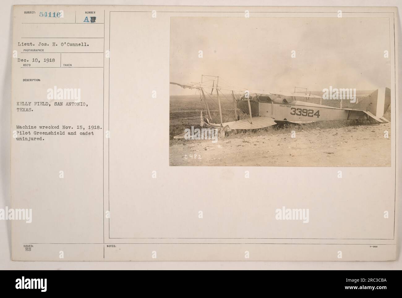 Kelly Field, San Antonio, Texas. This photo shows the wreckage of a military aircraft that occurred on November 15, 1918. The pilot, Greenshield, and the cadet onboard were fortunately uninjured. The photo was taken by Lieutenant Jos. H. O'Connell on December 10, 1918. Stock Photo