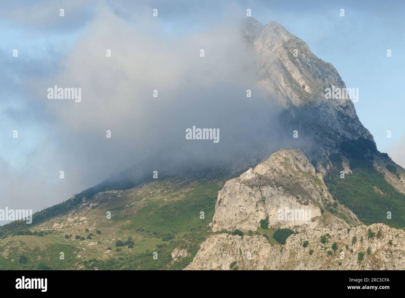 Mount Gilbo in the mist, next to Riaño Stock Photo