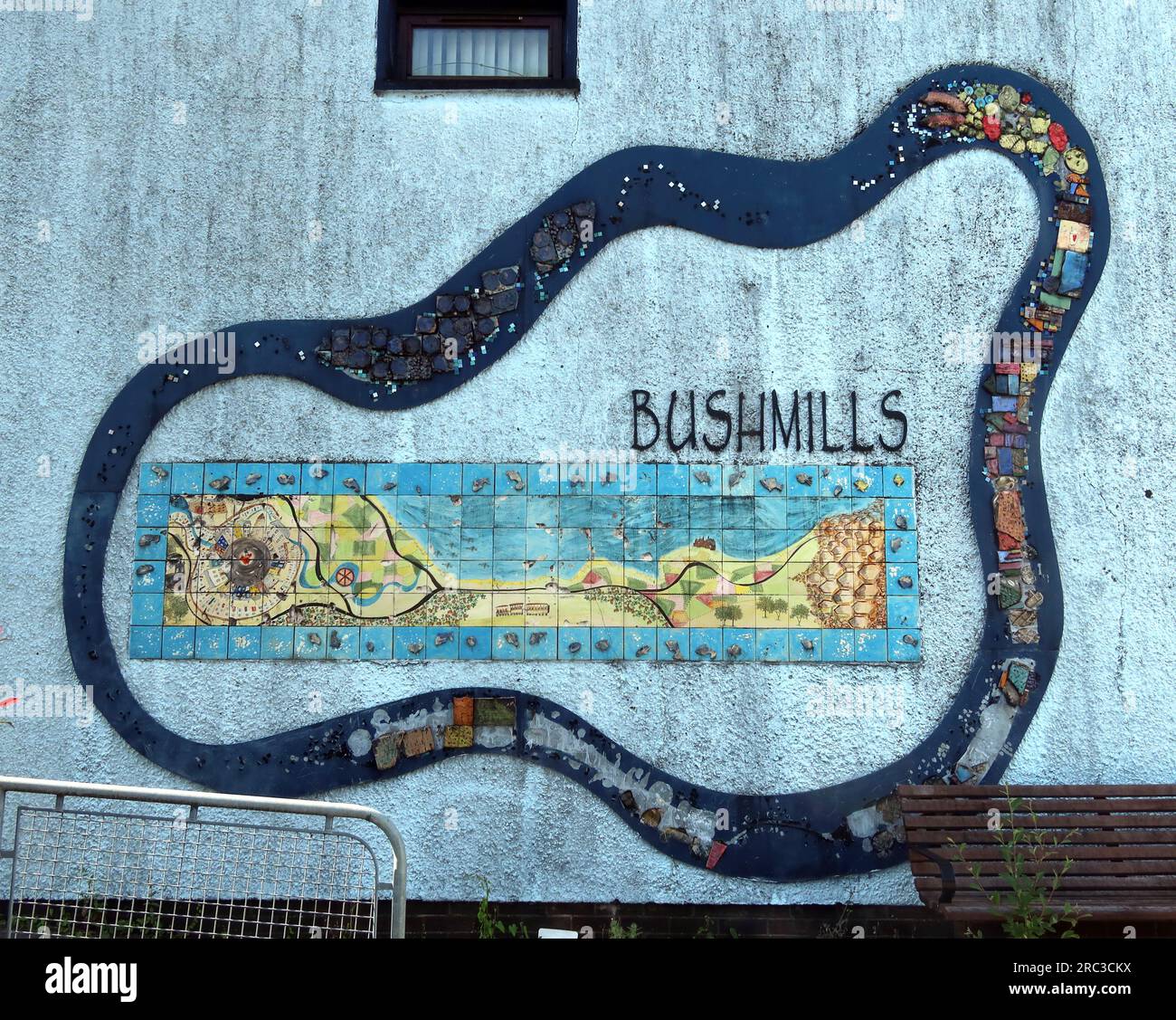 Tourist murals in Bushmills, showing the village and nearby attractions,  Riverside Ct, Bushmills, County Antrim, Northern Ireland, UK,  BT57 8SF Stock Photo