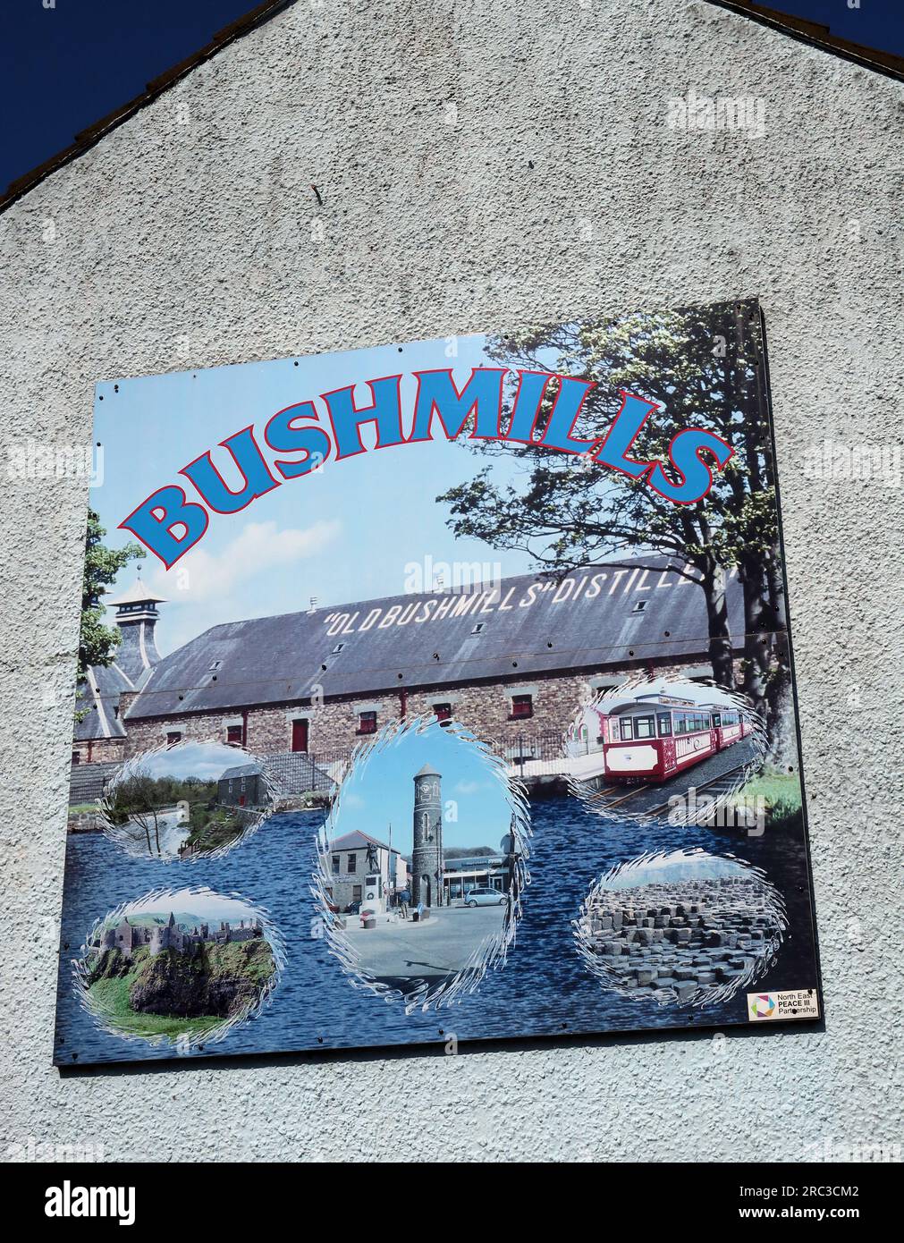 Tourist murals in Bushmills, showing the village and nearby attractions,  Riverside Ct, Bushmills, County Antrim, Northern Ireland, UK,  BT57 8SF Stock Photo