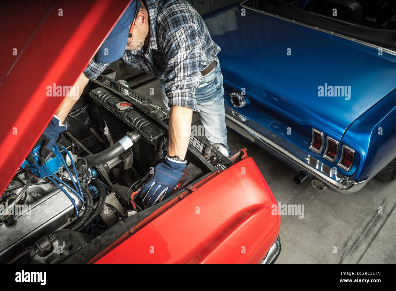 Professional Mechanic Restoring Classic Muscle Cars. Looking Under the