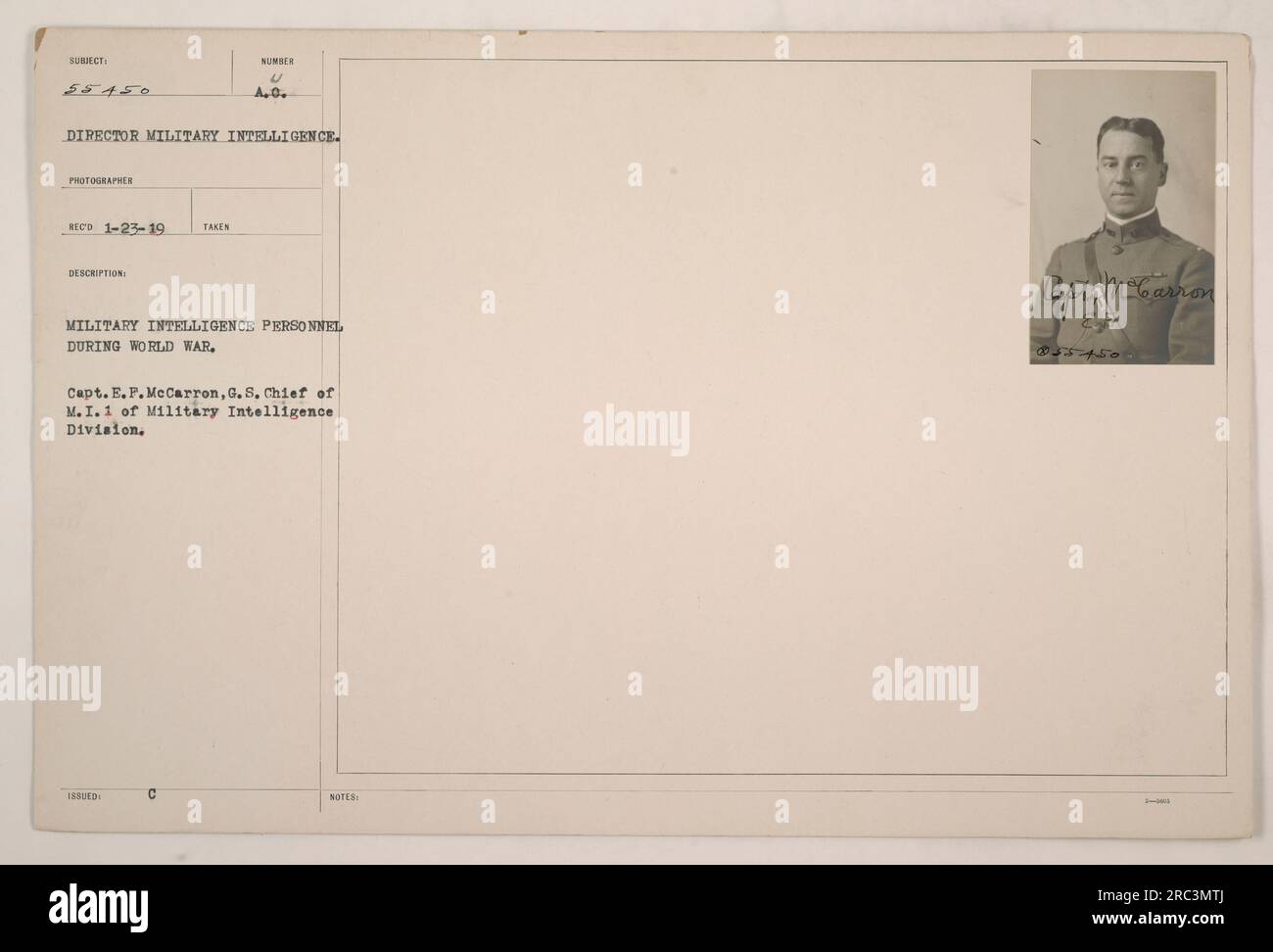 Capt. E.F. McCarron, Chief of M.I.1 in the Military Intelligence Division during World War I, is pictured with other military intelligence personnel. This photograph was taken on January 23, 1919. Issued with Order C Notes, Capt. McCarron is identified as being designated by the number U A.O. (unidentified allied officer). Stock Photo