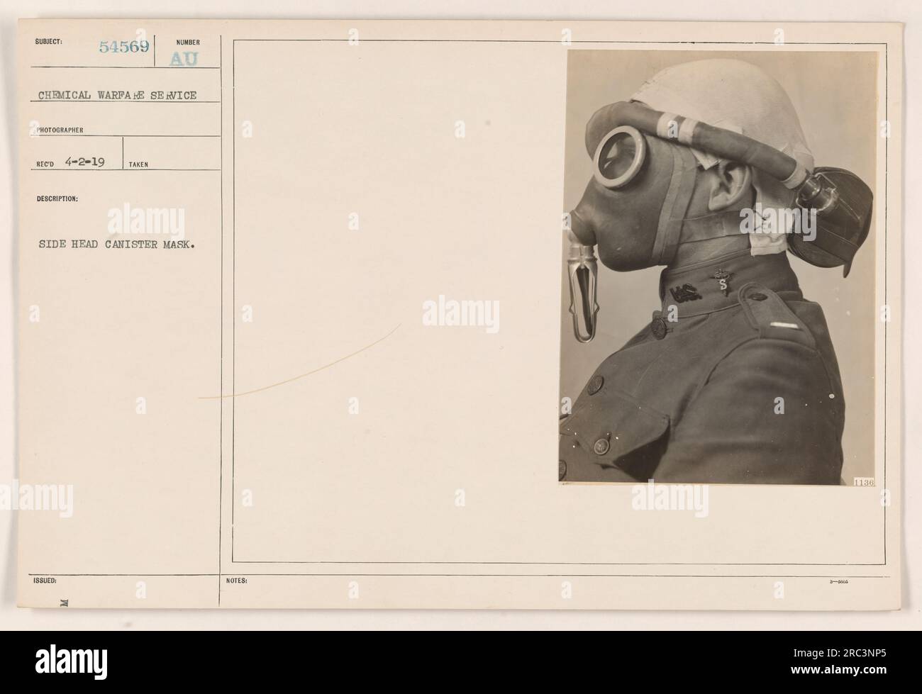 American soldiers wearing side head canister masks during World War I