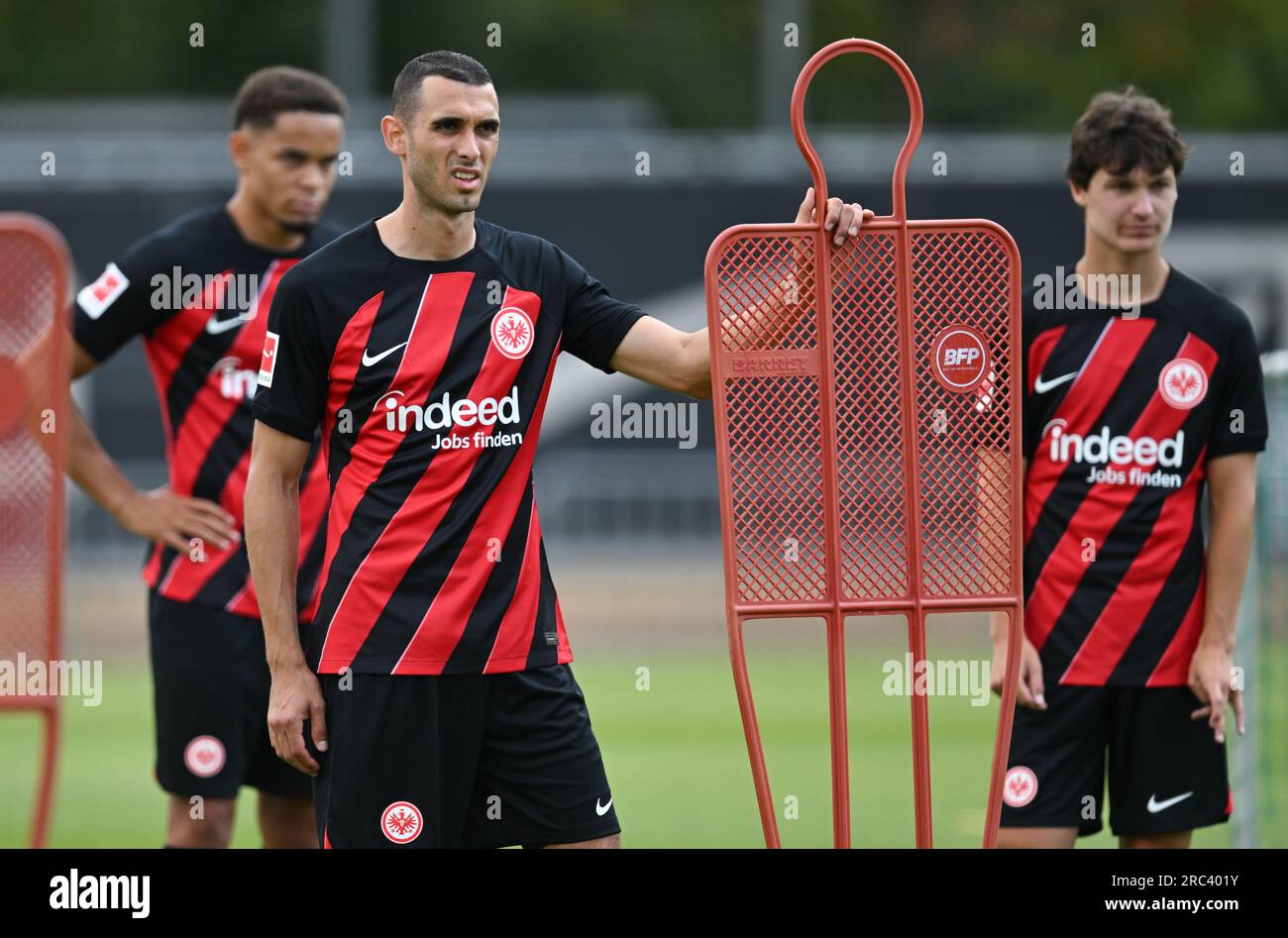 12 July 2023, Hesse, Frankfurt/Main: Dario Gebuhr (l-r), newcomer Ellyes Skhiri and Paxten Aaronson attend Eintracht Frankfurt's official training kick-off at the stadium. Photo: Arne Dedert/dpa Stock Photo