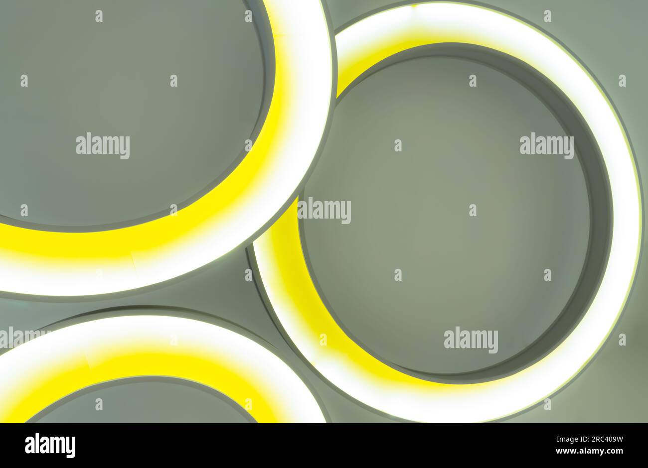 Look up to the round ceiling mounted light fixtures. Yellow circular