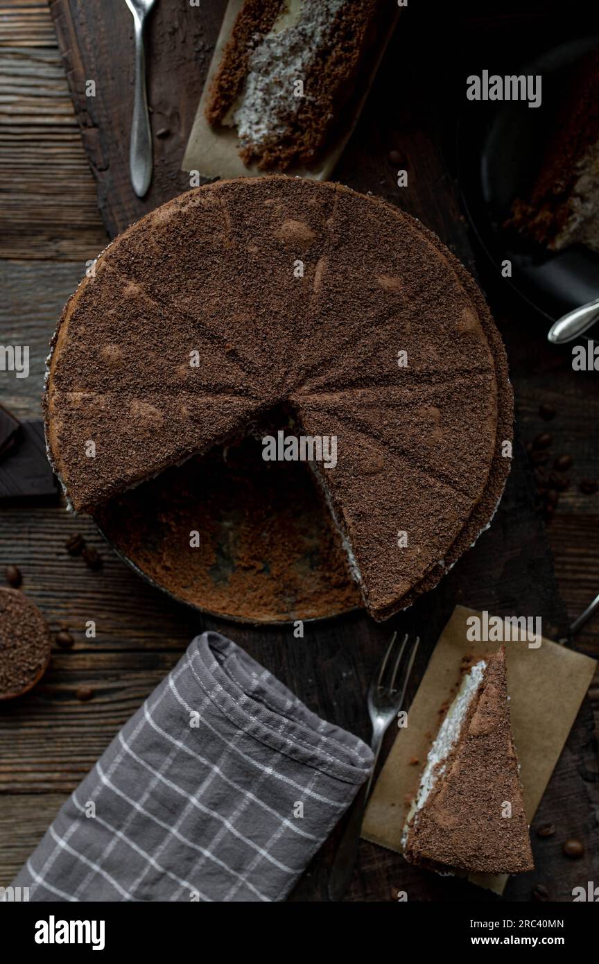 Chocolate cake on a rustic wooden background. Top view. Stock Photo
