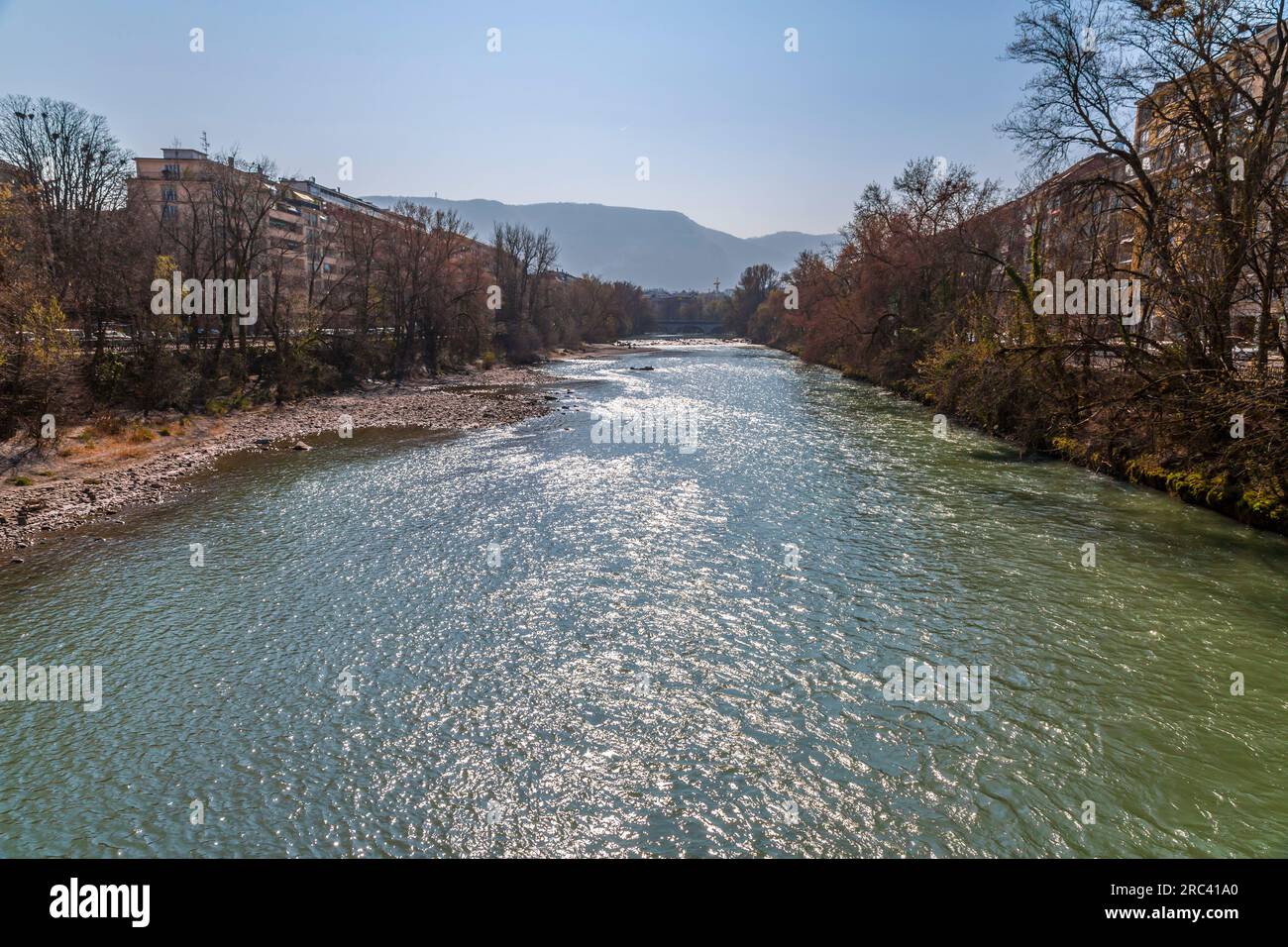 Clear waters of Rhone River and buildings around it in Geneva, Switzerland. Stock Photo