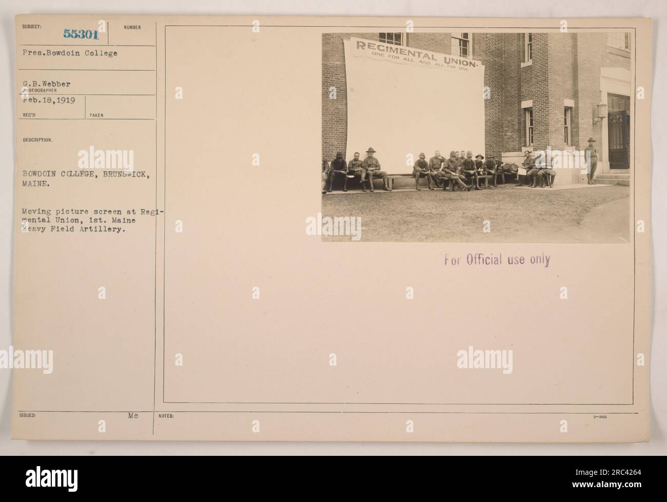 'BOWDOIN COLLEGE, BRUNSWICK, MAINE. This photograph shows a moving picture screen at the Regimental Union of the 1st Maine Heavy Field Artillery. The image, taken on February 18, 1919, was published with reference number 55301. The screen was used for official purposes and was located at Bowdoin College in Brunswick, Maine.' Stock Photo