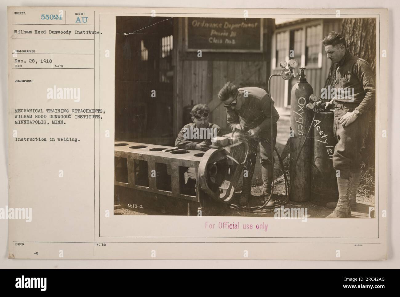 The photograph shows a group of individuals at the Wilham Hood Dunwoody ...