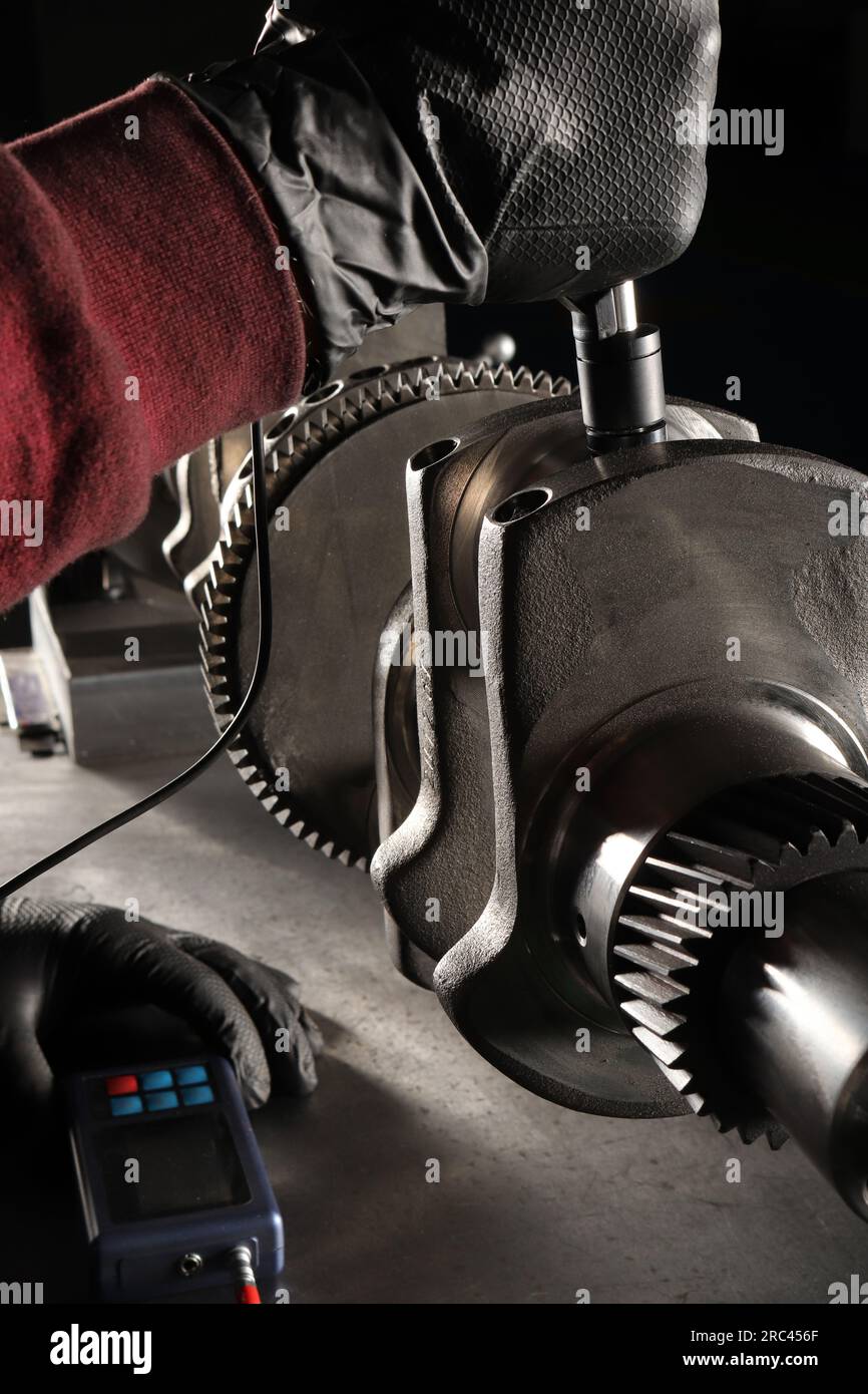 Master makes metal hardness measurement. Crankshaft Stock Photo Alamy