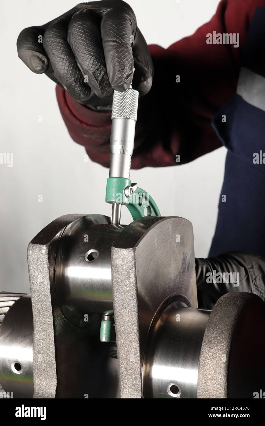 Master makes metal hardness measurement. Crankshaft Stock Photo Alamy