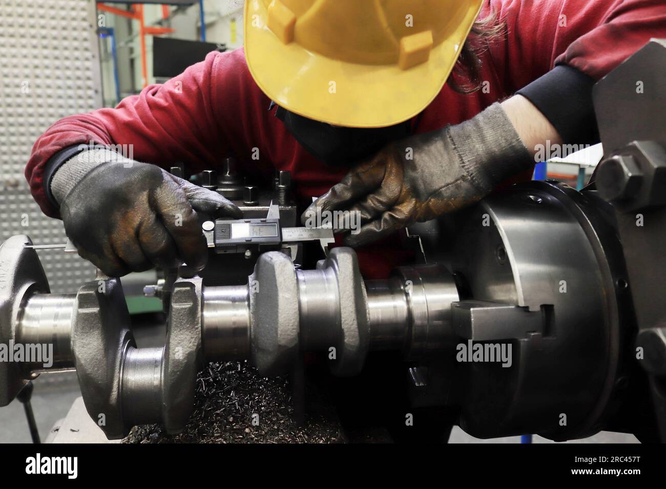 Master makes metal hardness measurement. Crankshaft Stock Photo Alamy