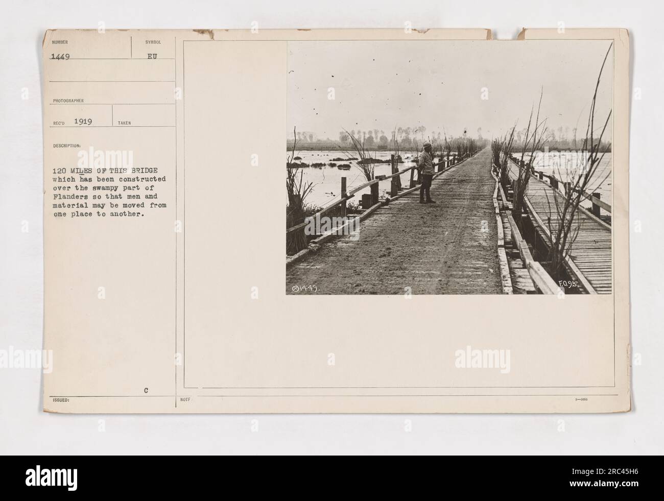 The image shows a 120 mile boardwalk bridge that was constructed over the swampy part of Flanders during World War One. The purpose of the bridge was to facilitate the movement of men and material from one location to another. The photograph was taken in 1919. Stock Photo