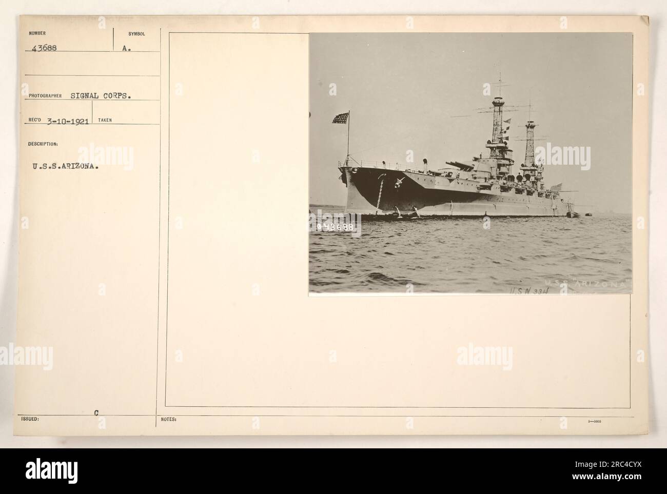 The U.S.S. Arizona in the 1910s. This photograph, taken by a Signal Corps photographer, shows the ship with the symbol issued marked with '43688' and 'K ITS N 331'. The photo was labeled and dated as 'RECO 3-10-1921.' Stock Photo