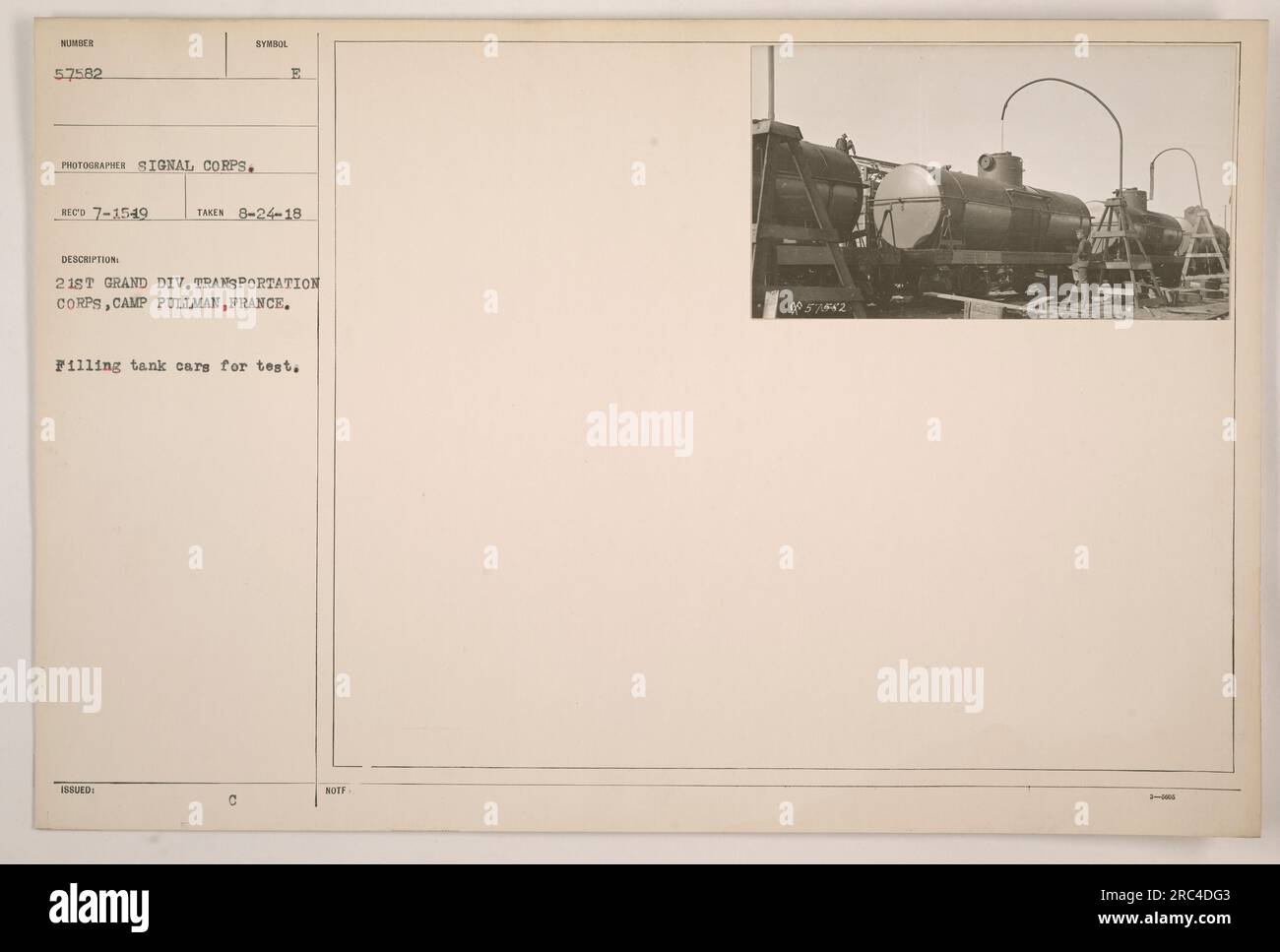 Personnel from the 21st Grand Div. Transportation Corps based at Camp Pullman in France are seen in this photograph filling tank cars for a test. The test was performed on August 24, 1918. The image was taken by a photographer from the Signal Corps and bears the identification numbers RECO 7-1549 and SYMBOL ISSUED E. Stock Photo
