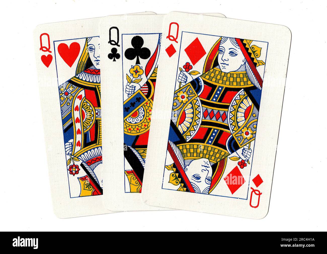 Vintage playing cards showing three queens on a white background Stock