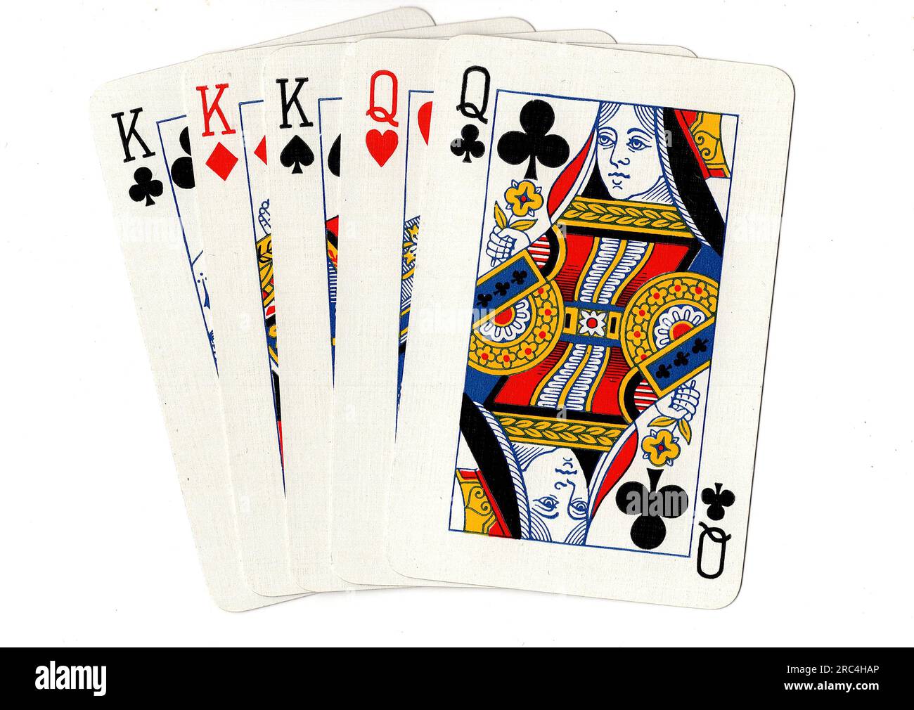 A poker hand of playing cards showing a full house of kings and queens
