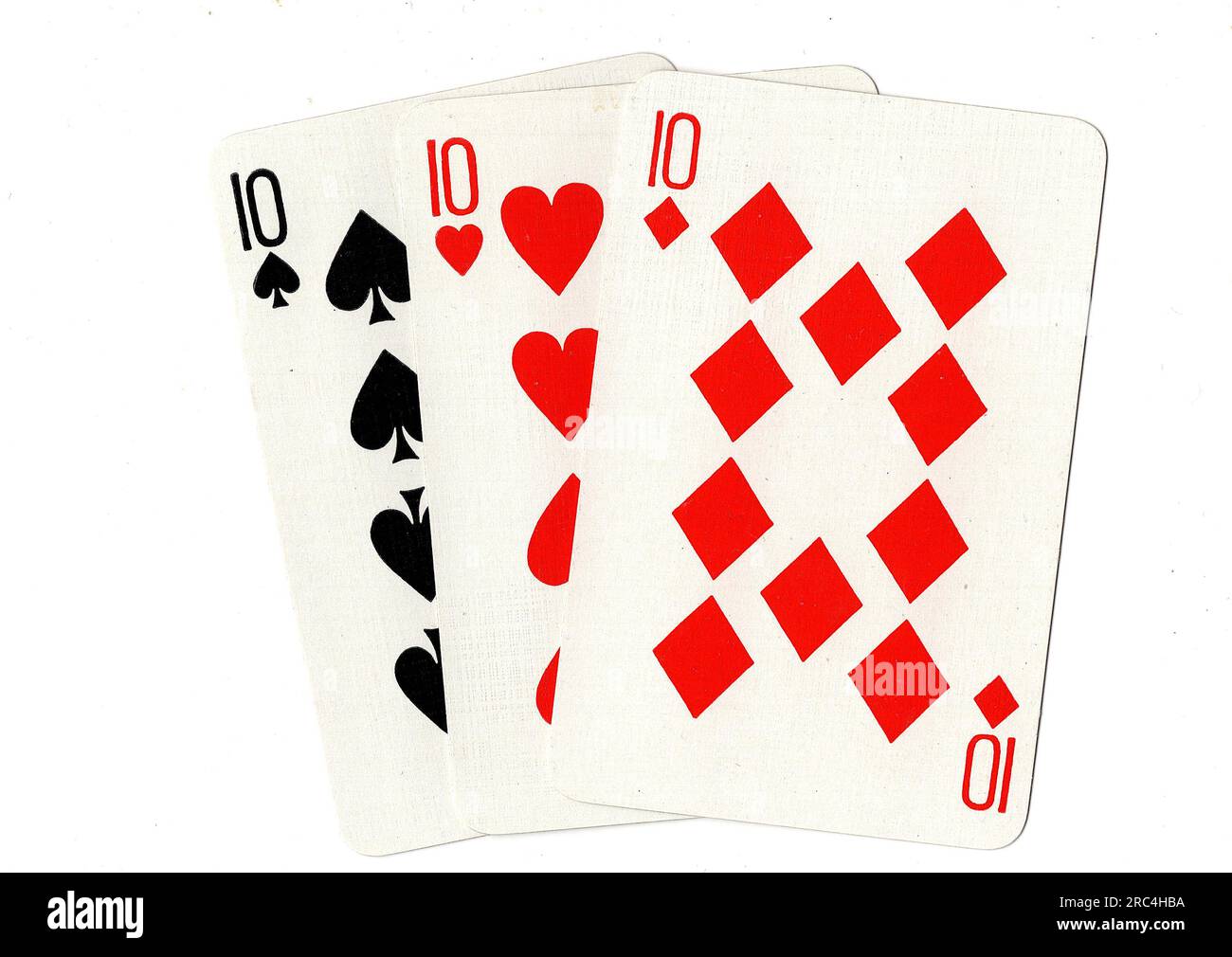 Vintage playing cards showing three tens on a white background Stock ...