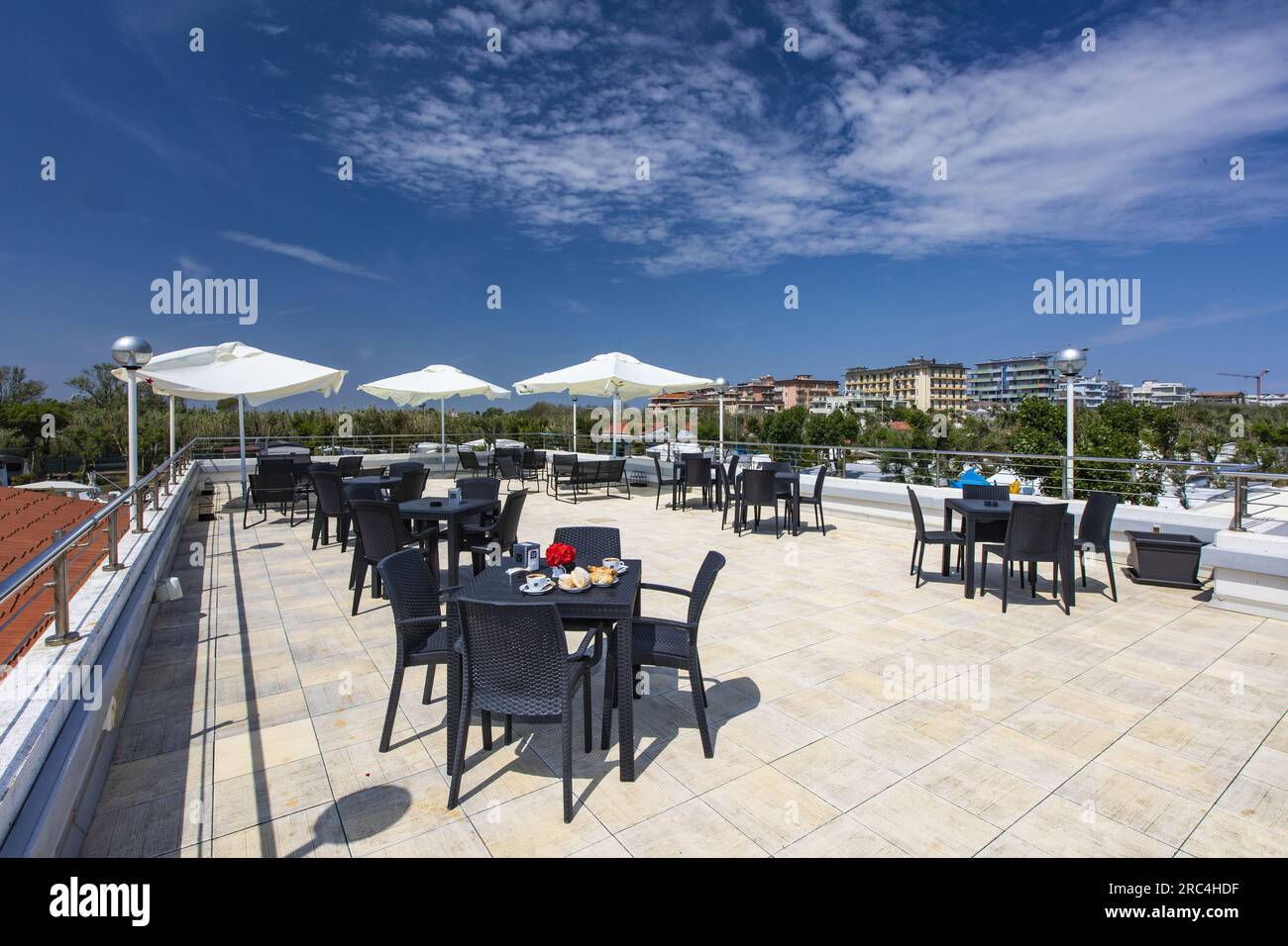 terrace of the restaurant bar on the swimming pool of the village Stock Photo