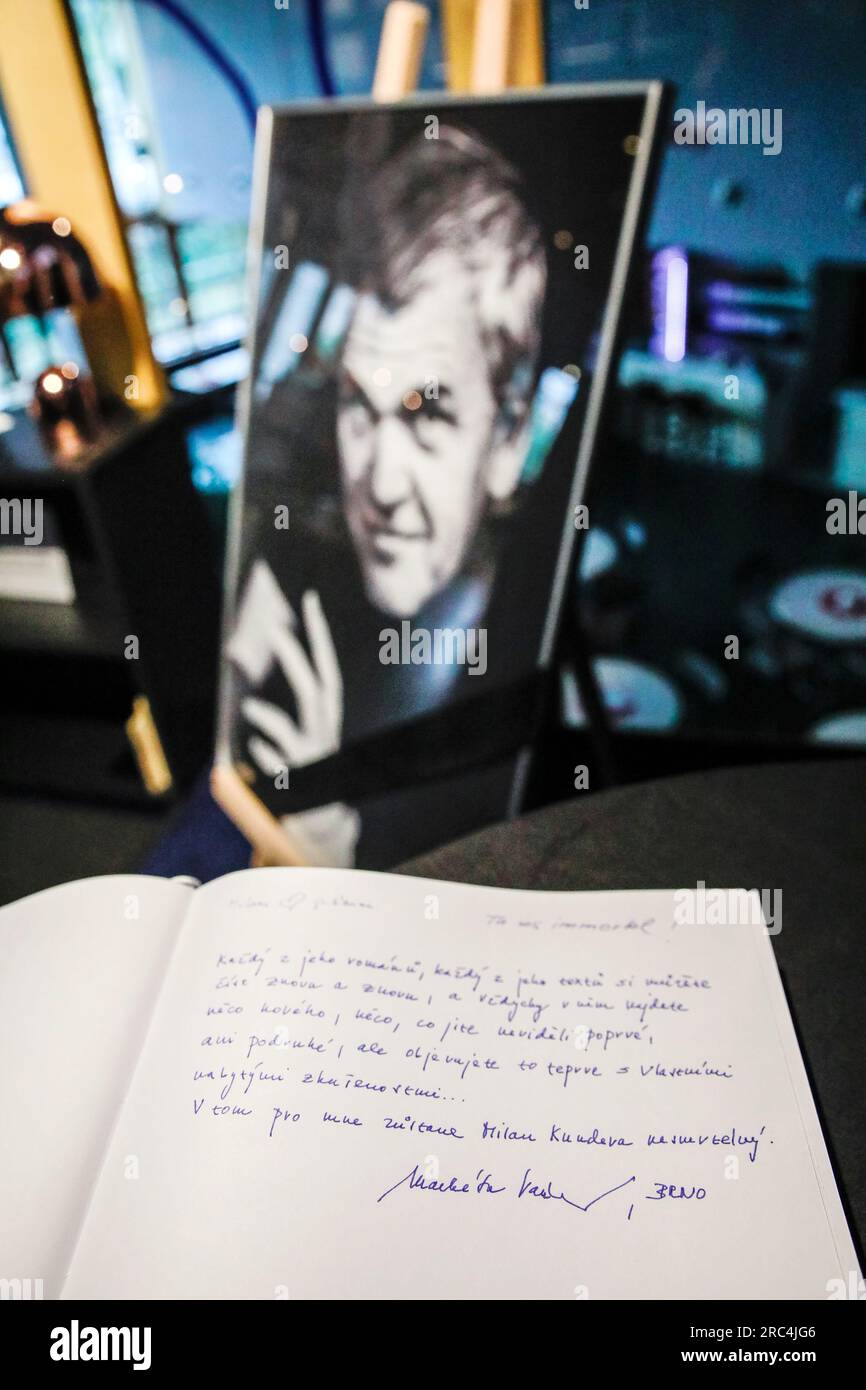 Brno, Czech Republic. 12th July, 2023. Condolence book and portrait of the late writer Milan Kundera, is seen on July 12, 2023, at the Milan Kundera Library, part of the Moravian Library (MZK) in Brno, Czech Republic. Czech-born writer Milan Kundera, living in France since 1975, has died at the age of 94 years Credit: Monika Hlavacova/CTK Photo/Alamy Live News Stock Photo