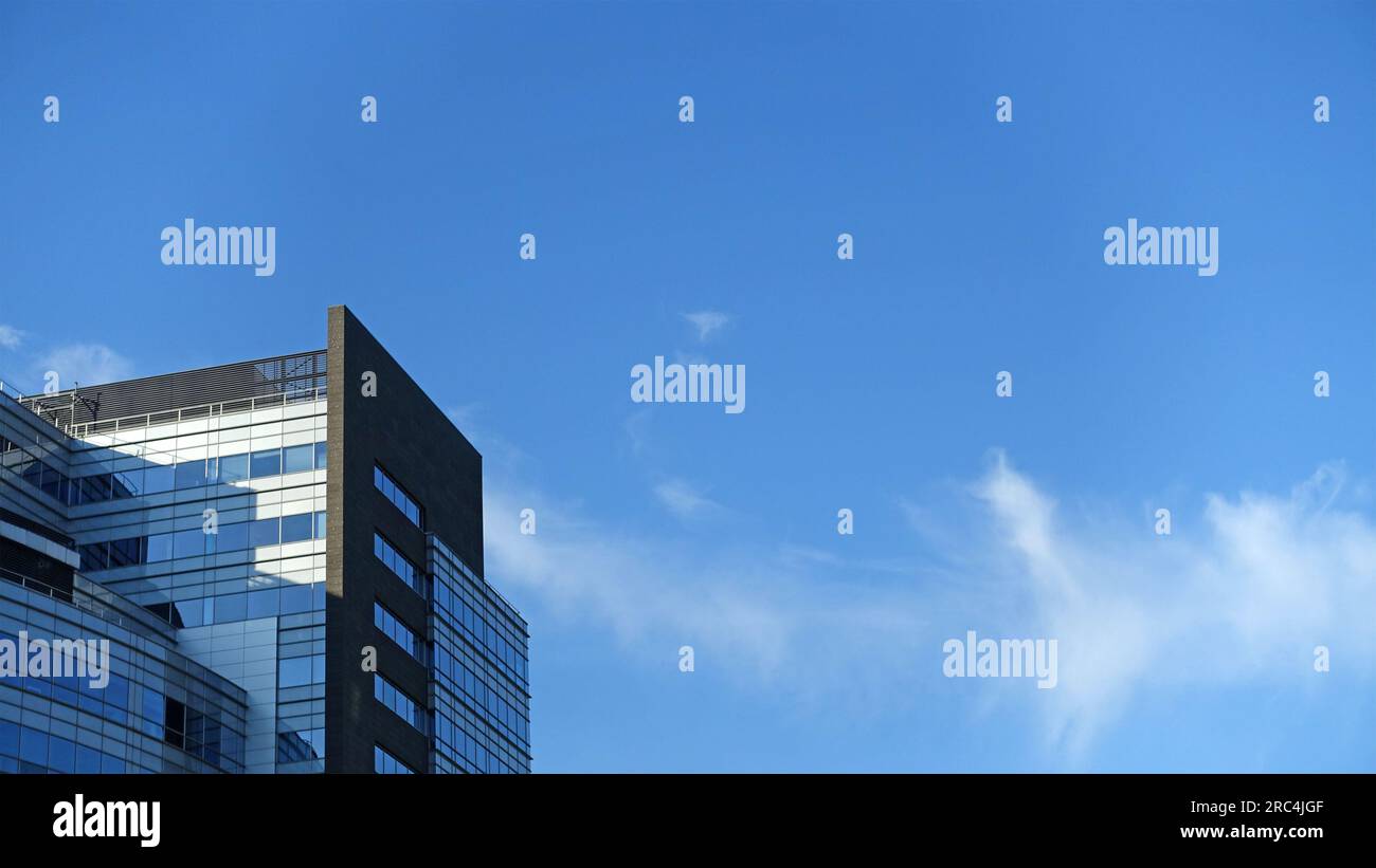 Modern office building against the evening sky Stock Photo - Alamy