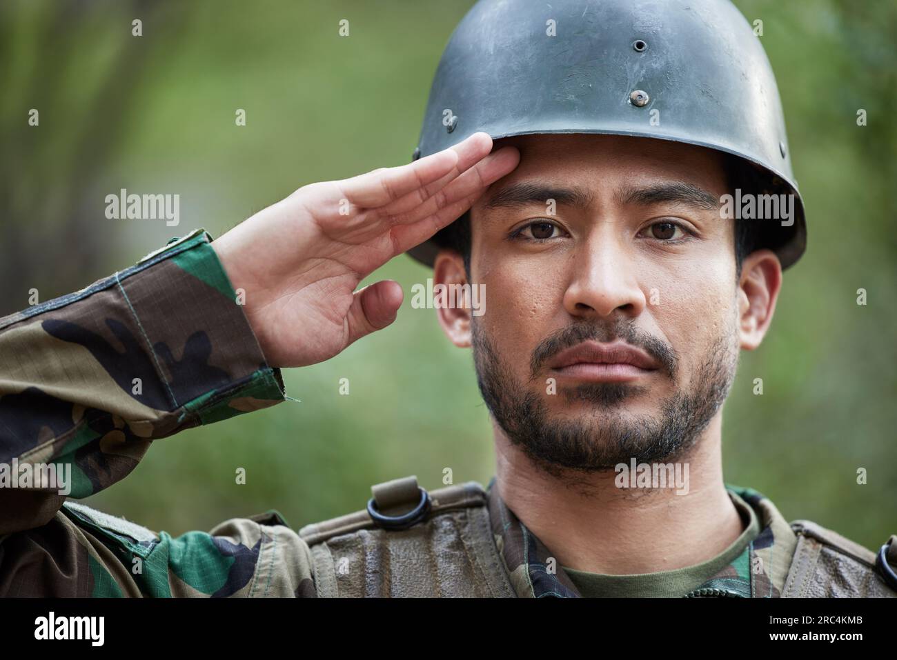 Army, man and salute portrait in military of a veteran with security, protection and battle. Male person, soldier and serious face with surveillance Stock Photo