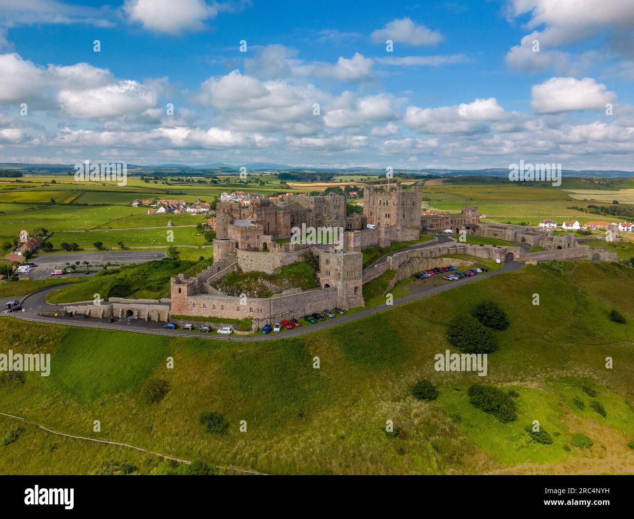 Aerial drone photo of Bamburgh Castle at the beautiful coastline of ...