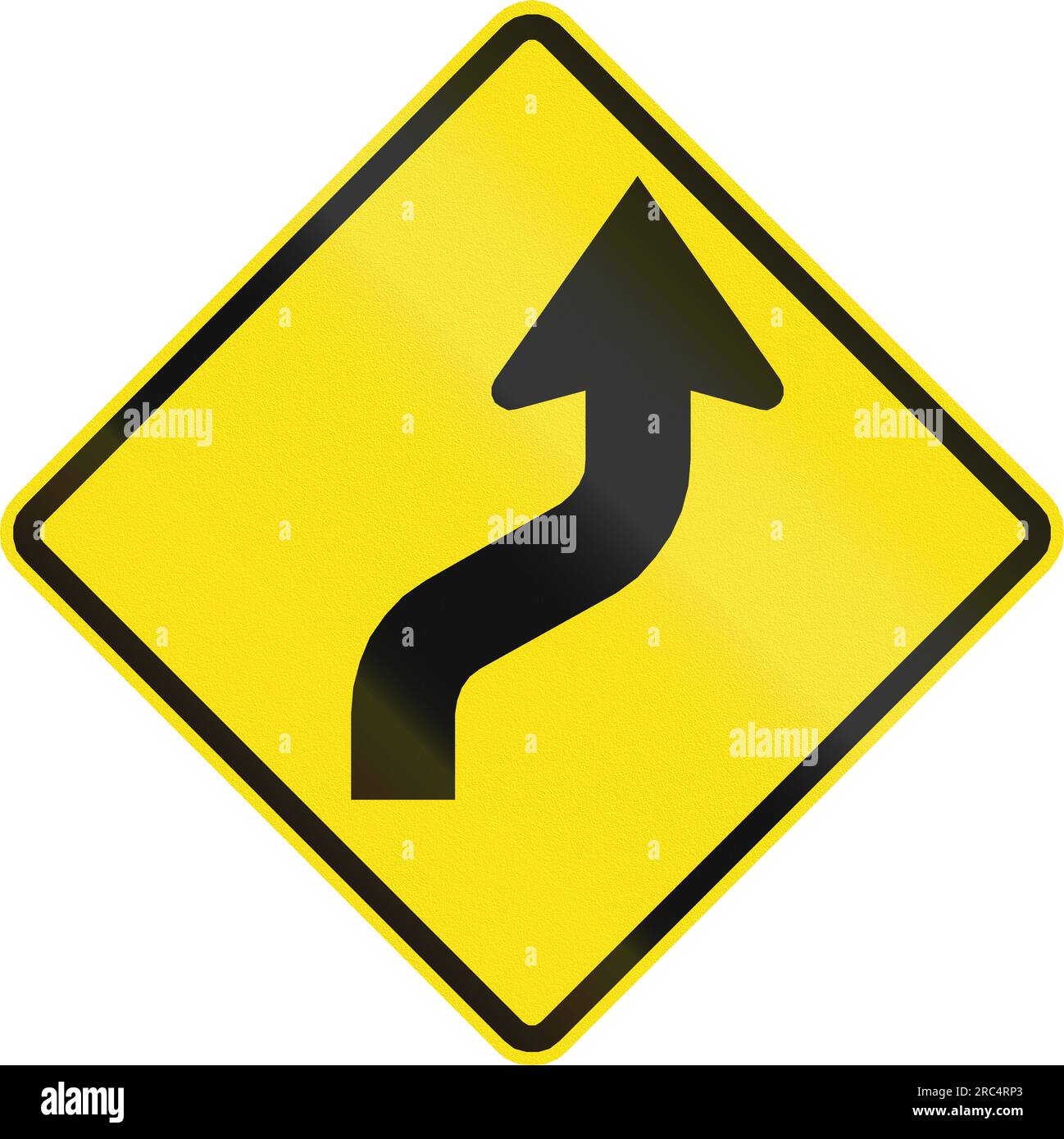 Chilean road warning sign: Reverse curve first to right Stock Photo