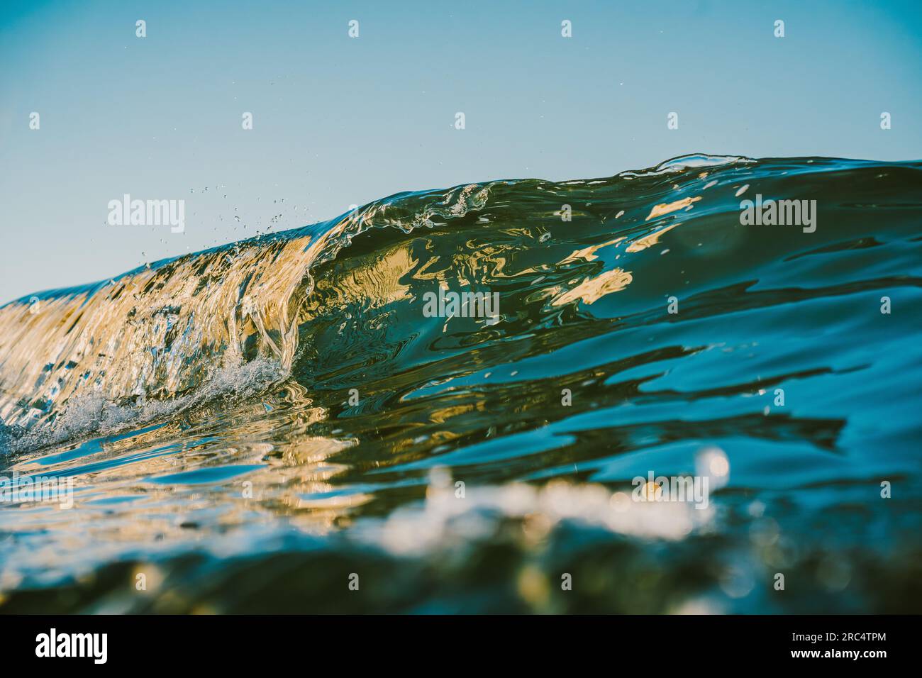 Powerful foamy sea waves rolling and splashing over water surface ...