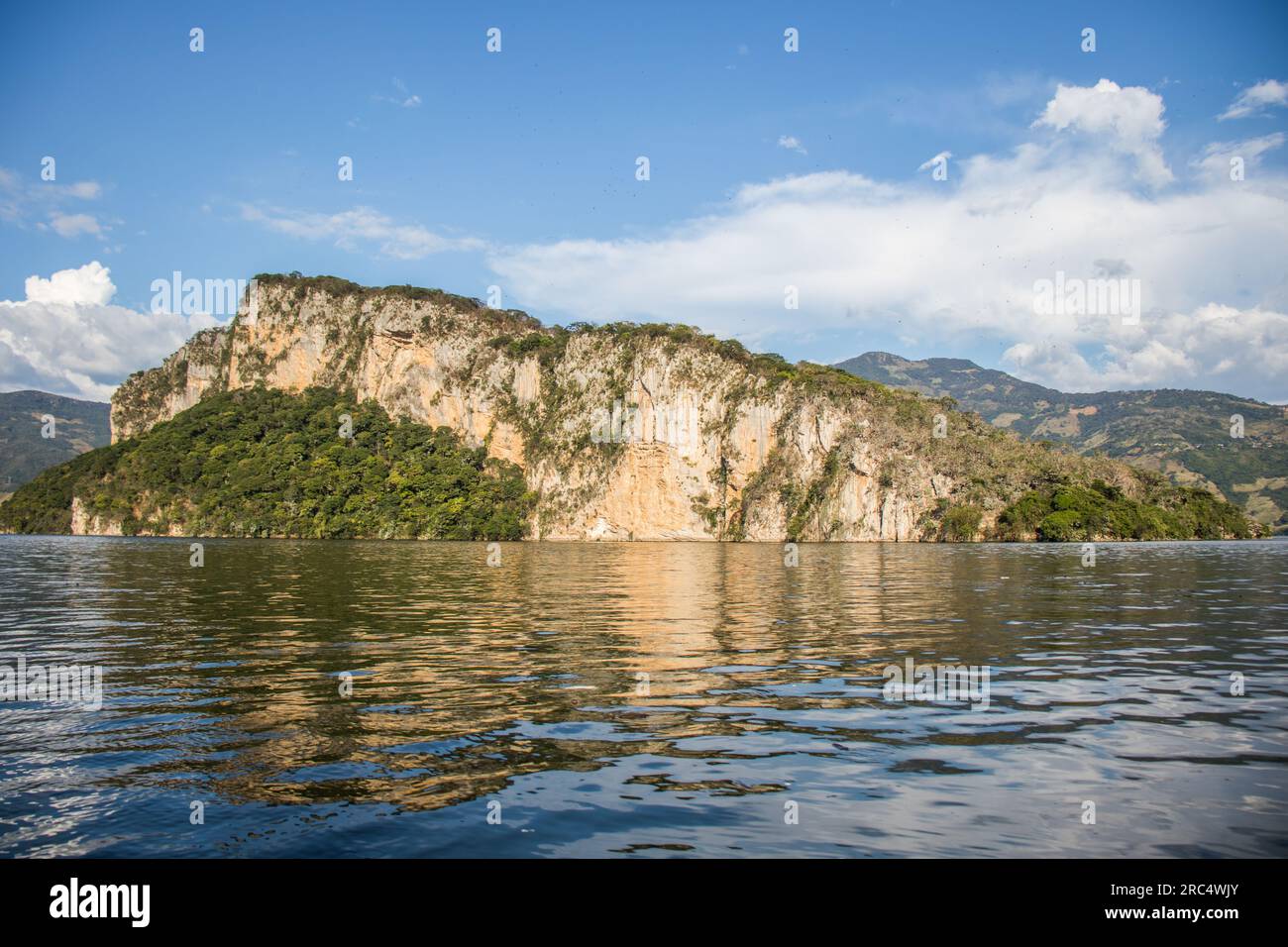 Picturesque view of Sumidero Canyon and Grijalva River against cloudy blue sky in Chiapas Mexico Stock Photo