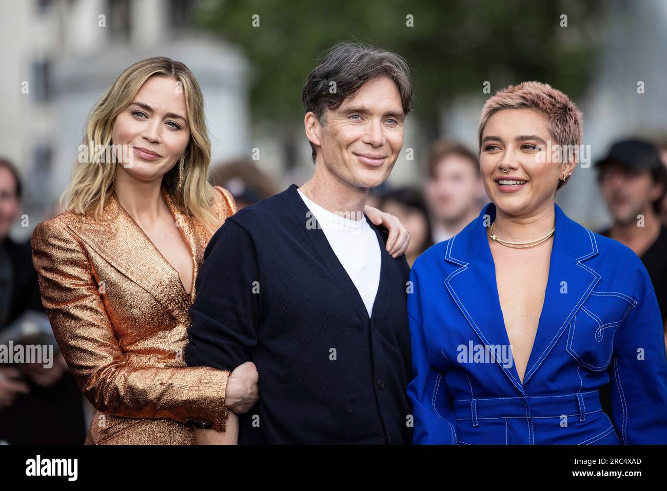 Cillian Murphy, Emily Blunt and Florence Pugh pose for photographers at