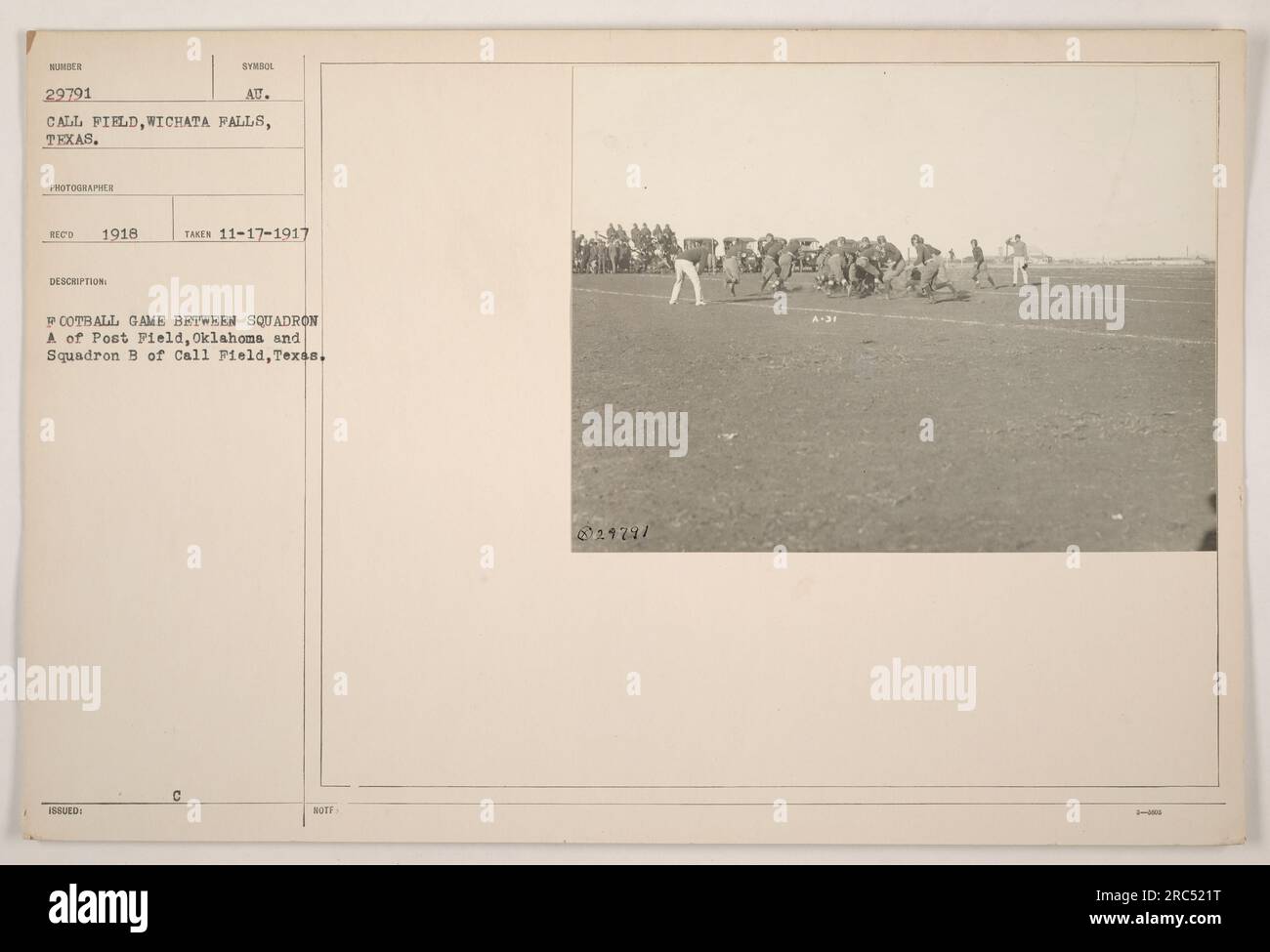 Caption: Squadron A from Post Field, Oklahoma competes against Squadron B from Call Field, Texas in a football game at Call Field, Wichita Falls, Texas on November 17, 1917. This photograph, taken by an unidentified NU photographer, captures a moment during the game. Image ID: 111-SC-29791. Stock Photo