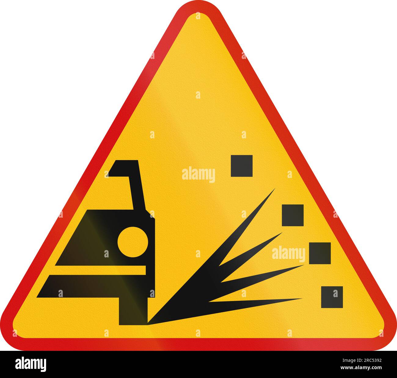 Polish traffic sign: Loose Chippings Stock Photo - Alamy