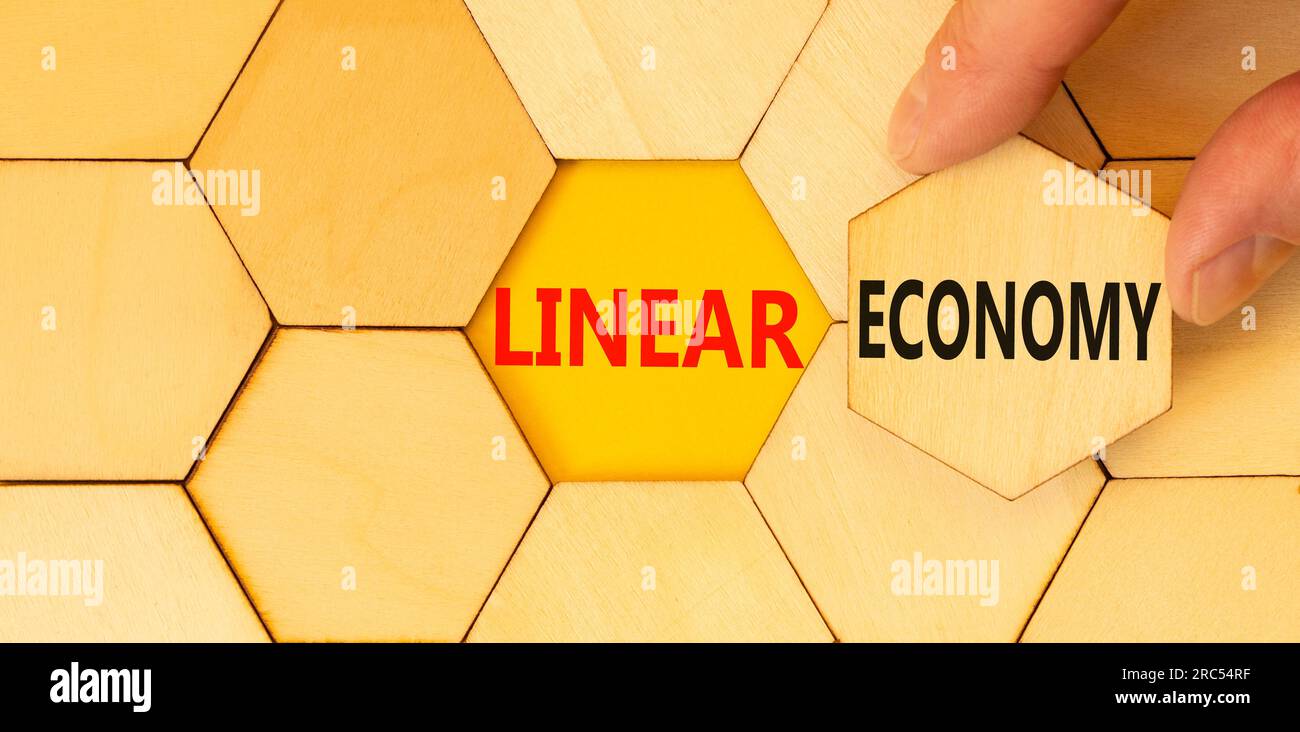 Linear economy symbol. Concept words Linear economy on beautiful wooden ...