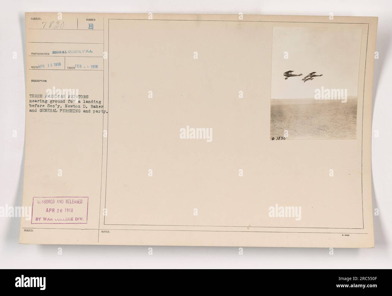 Three American aviators preparing to land before Secretary Newton D