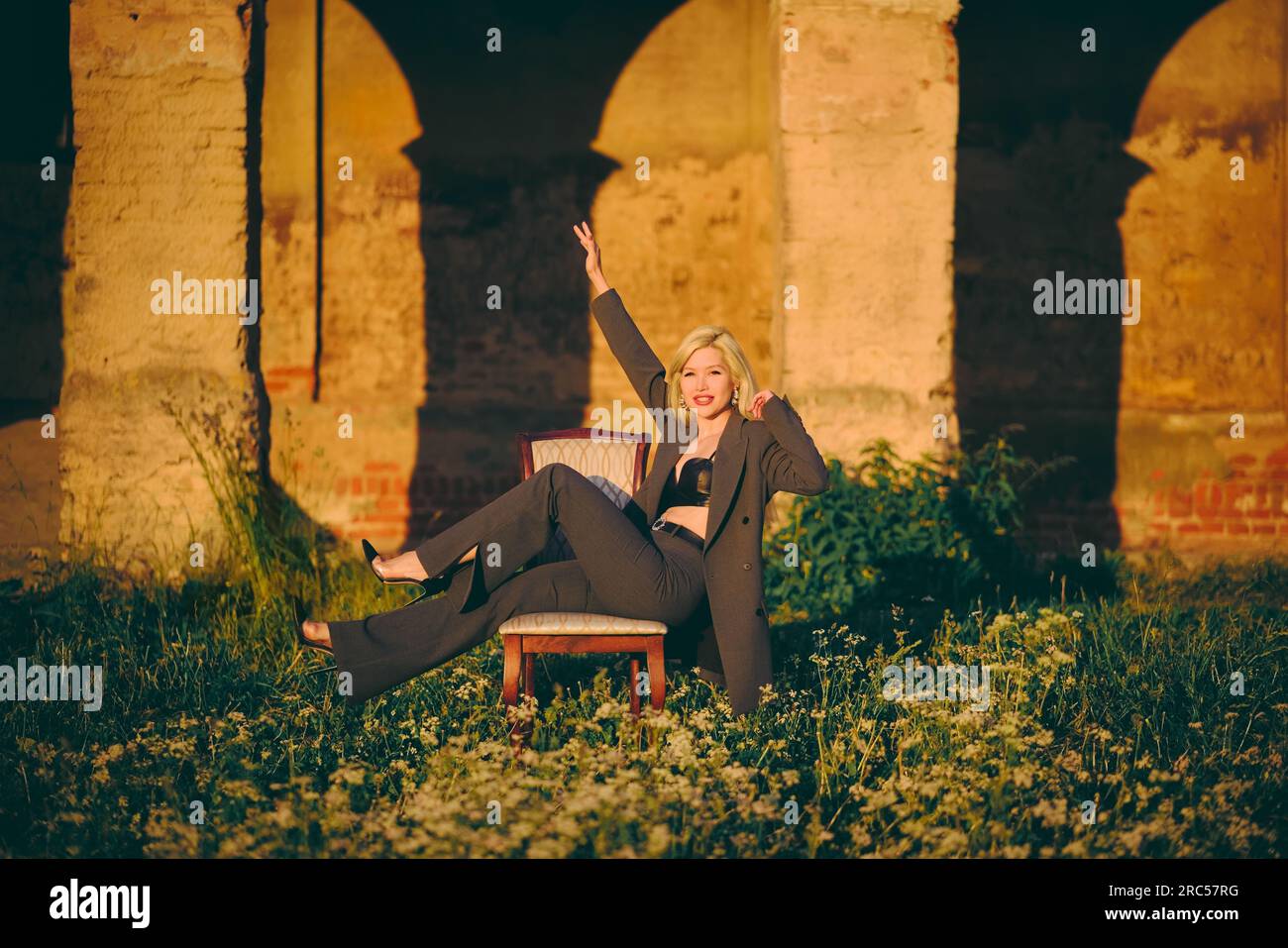 Lady sits in chair hi-res stock photography and images - Alamy