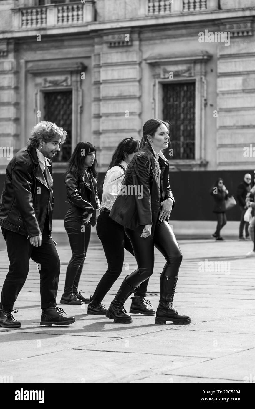 Turin, Italy - March 27, 2022: Group of young people performing a dancing choreography for a video shooting at the Piazza Castello, Turin. Stock Photo