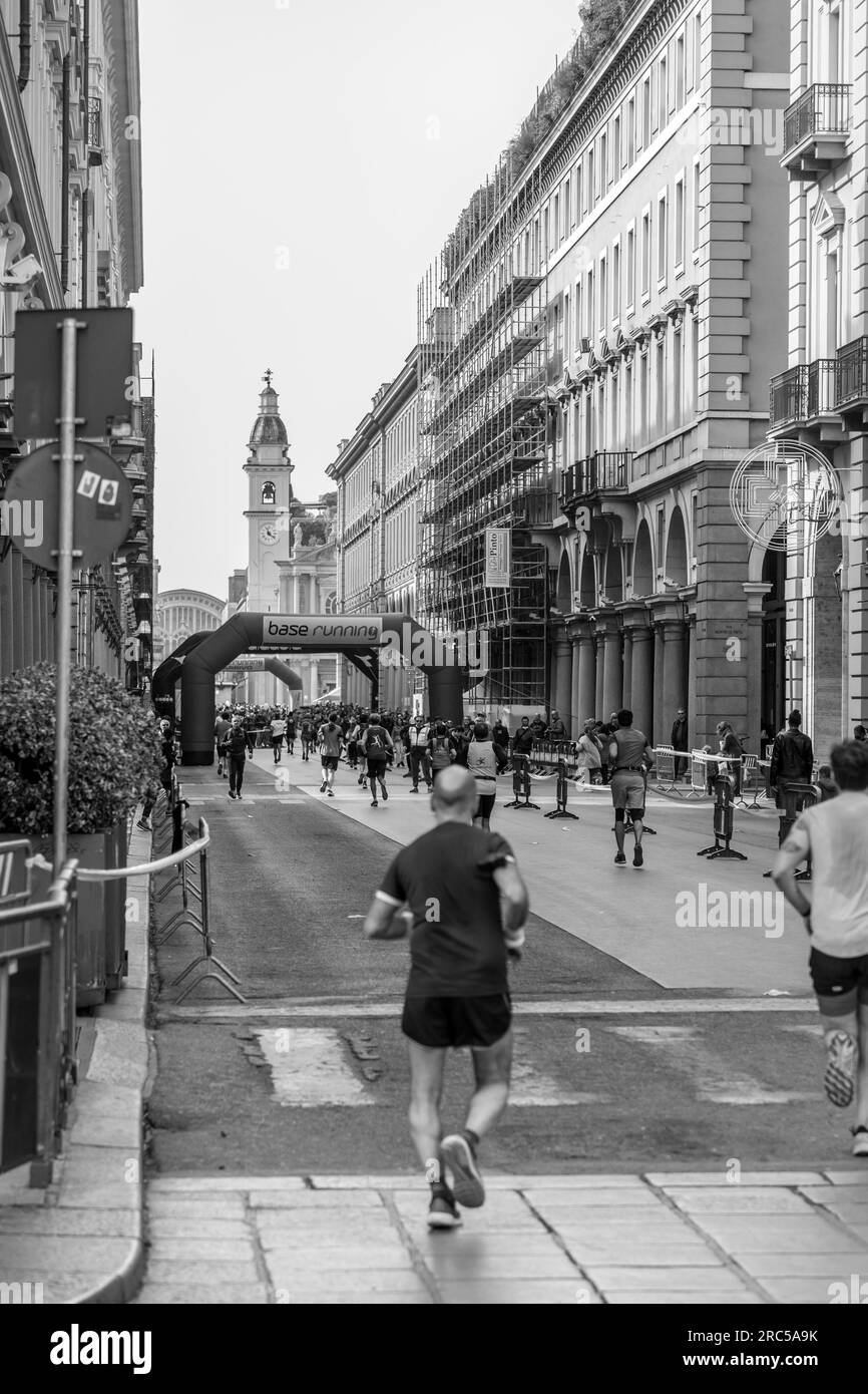Turin, Italy - March 27, 2022: Competitors running at the Turin Half Marathon held on March 27, 2022 in Turin, the capital of Piedmont, Italy. Stock Photo