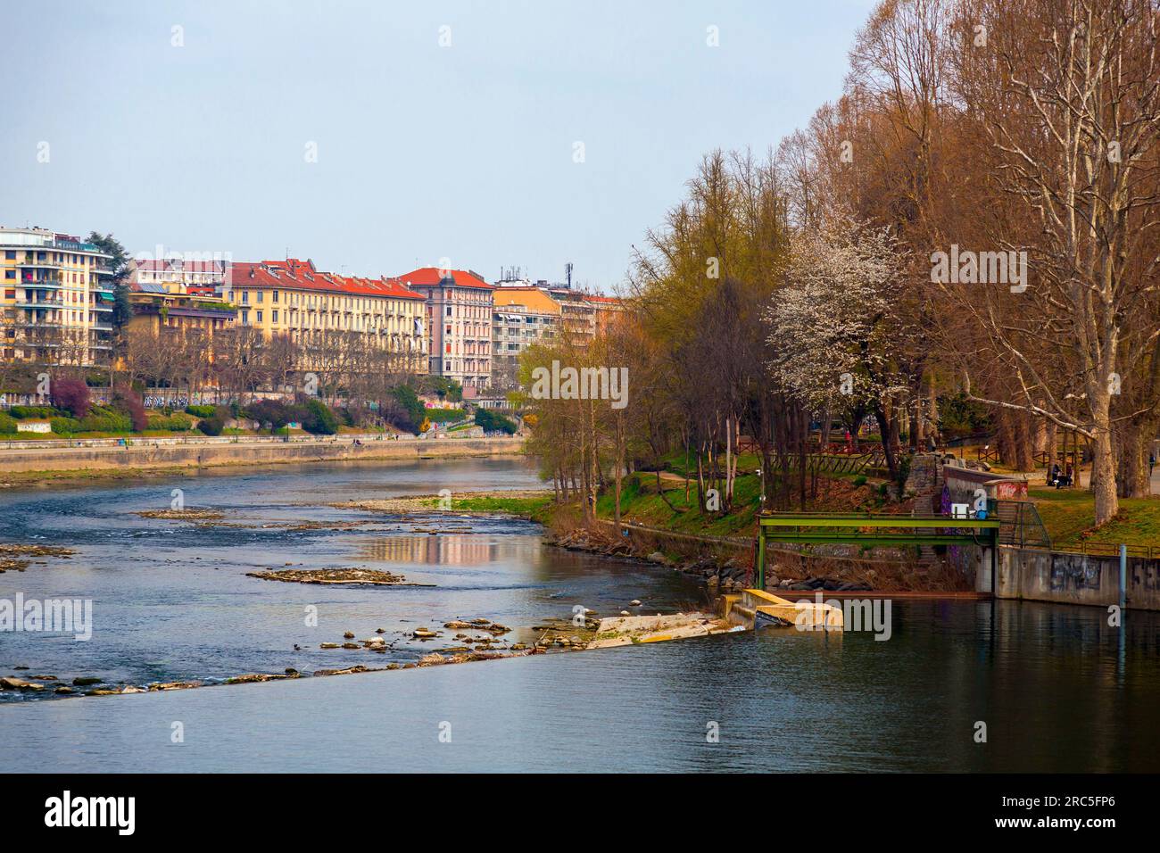 Turin, Italy - March 27, 2022: Buildings surrounding Po River, the longest river in Italy, Piedmont, Turin, Italy. Stock Photo
