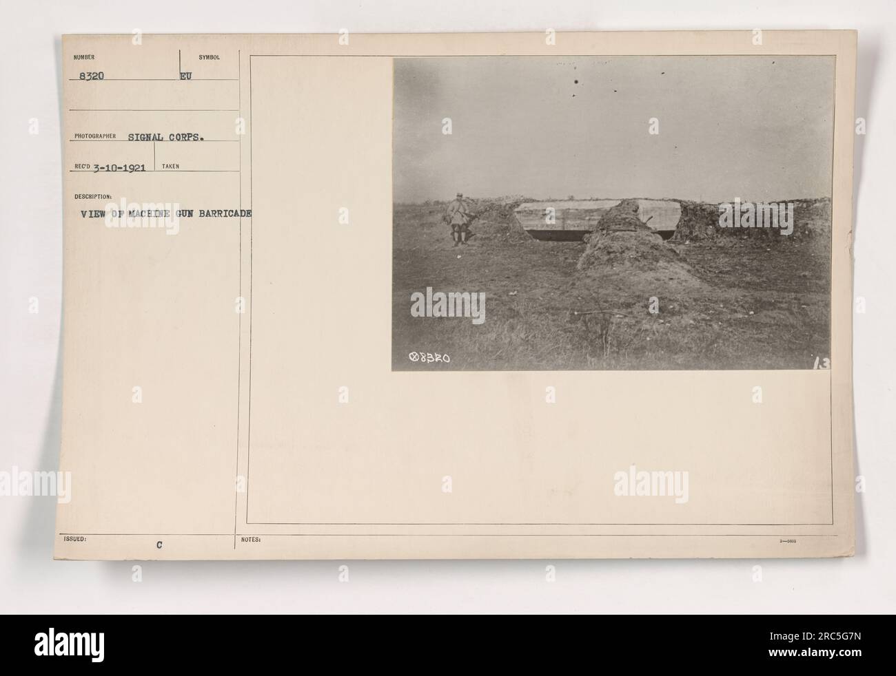View of a machine gun barricade taken by a European photographer in World War I. The photograph, with the symbol issued by the Signal Corps, was captured on March 10, 1921. The image showcases the structure of the barricade, providing insight into American military activities during the war. Stock Photo