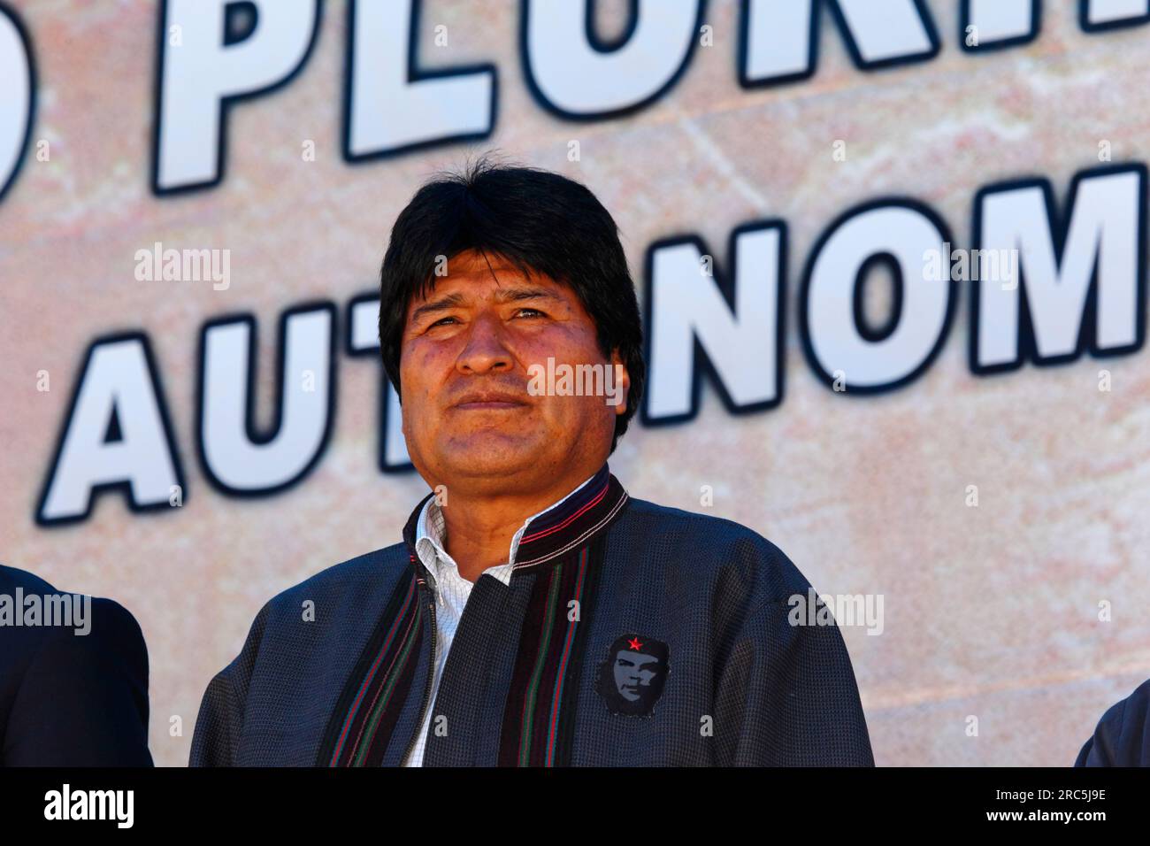 LA PAZ, BOLIVIA, 14th January. Bolivian president Evo Morales Ayma (a former coca grower and union leader) wears a jacket with a badge of Che Guevara on it while taking part in an event to celebrate Bolivia rejoining the 1961 UN Single Convention on Narcotic Drugs. Evo's expression and pose in this shot is similar to that of Che in the iconic  'El Guerrillero Heroico' photo taken by photographer Alberto Korda in 1960, which is the basis for the ubiquitous modern images of Che (including the badge on Evo's jacket). Stock Photo