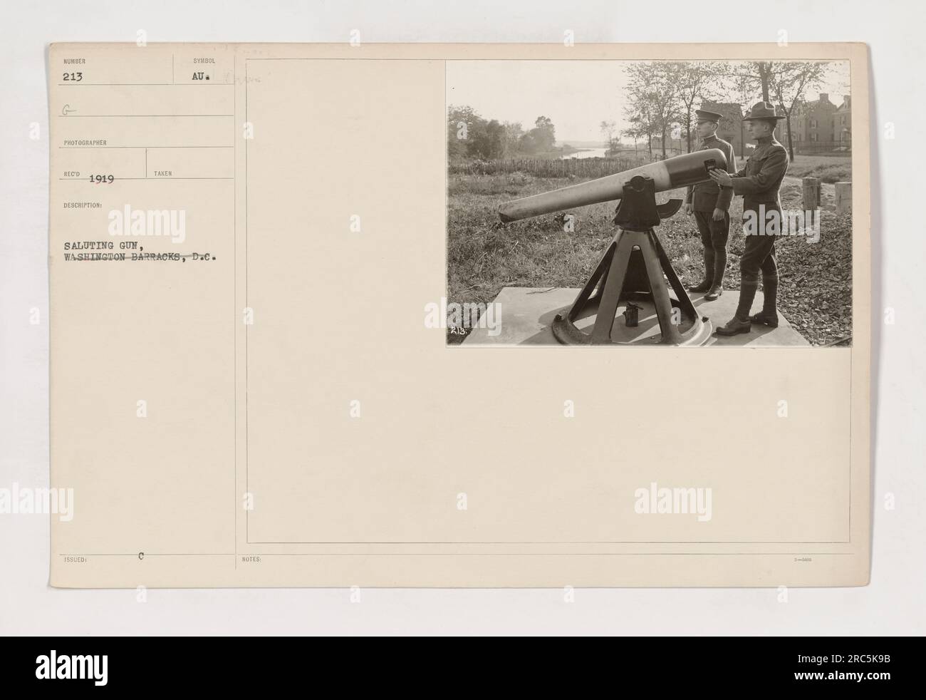 A soldier at Washington Barracks in Washington, D.C., salutes as he
