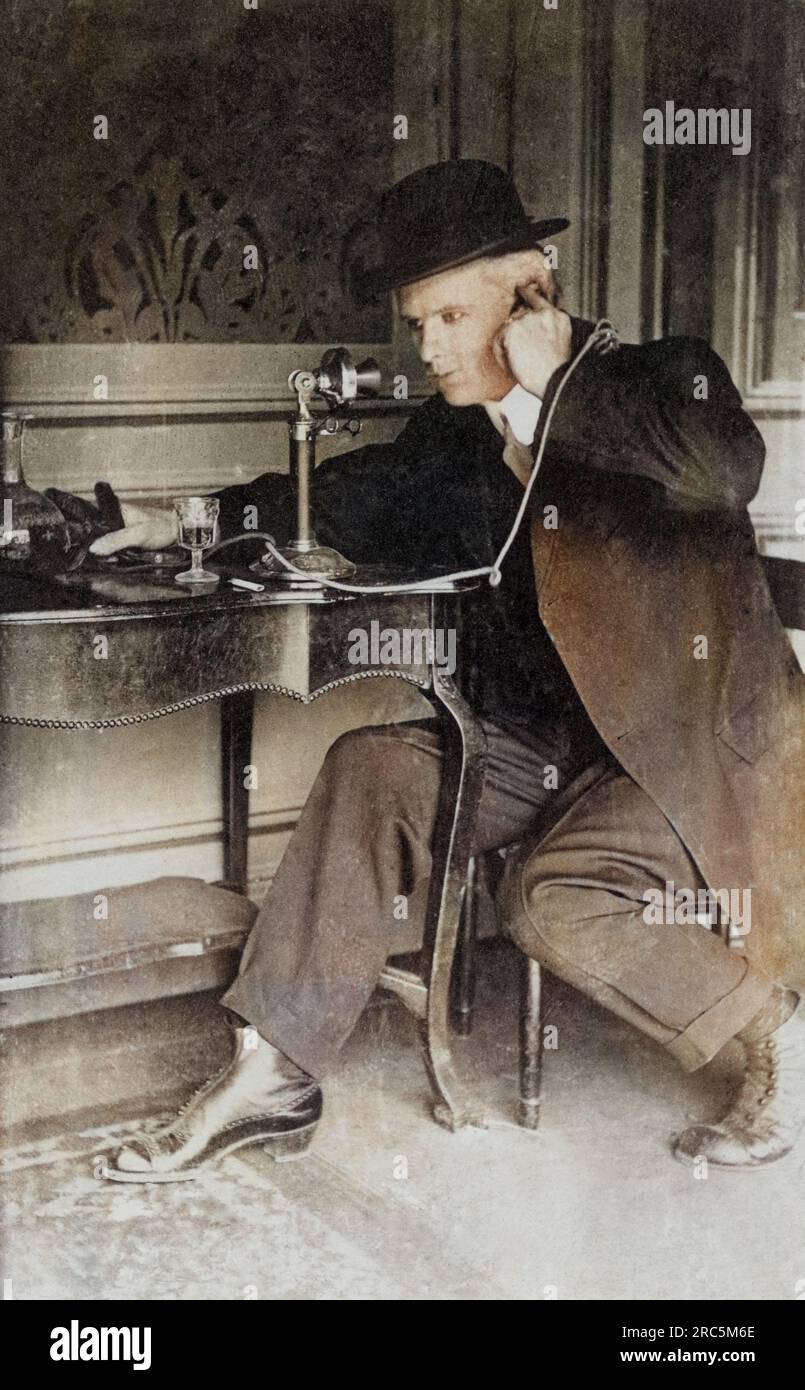 Humorous photo circa 1915 of a man dressed up and speaking on an old