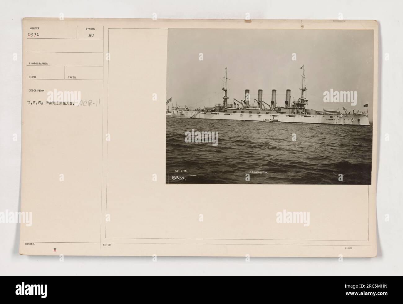 A photograph of the U.S.S. Washington (ACR11) being commanded by Ed