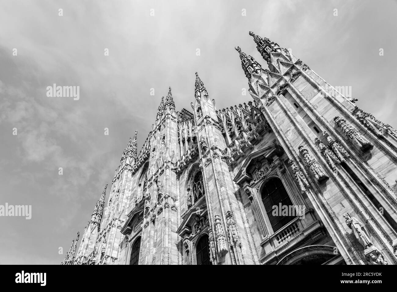 The Milan Cathedral or Metropolitan Cathedral-Basilica of the Nativity of Saint Mary is a major cathedral in Milan. Stock Photo