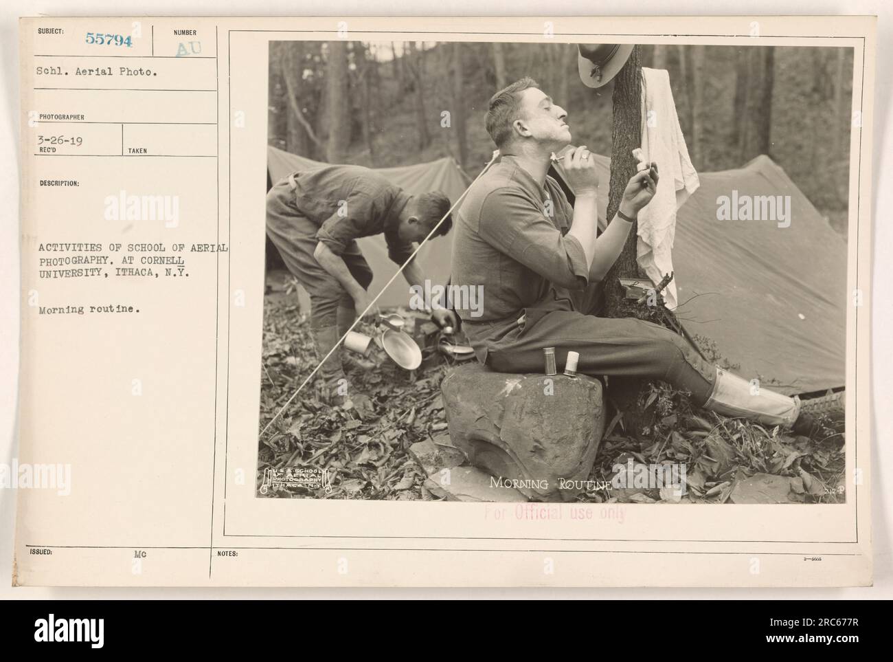 'Morning routine activities at the School of Aerial Photography, Cornell University, Ithaca, New York. This photograph captures students engaged in undisclosed tasks on March 26, 1919. For official use only.' Stock Photo