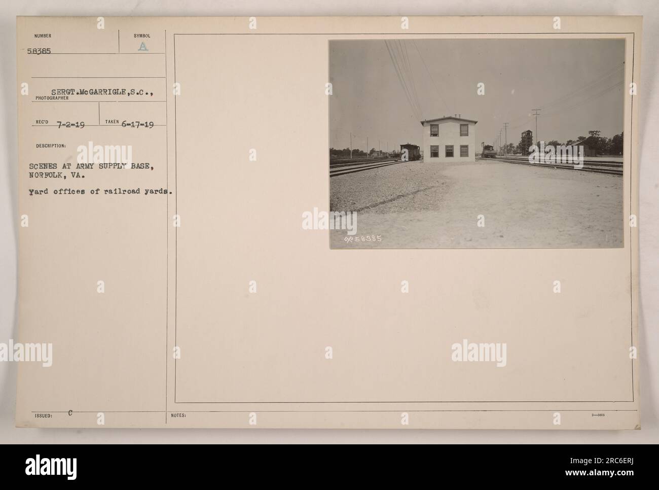 'Yard offices of railroad yards at Army Supply Base in Norfolk, VA. Photograph taken on June 17, 1919, by photographer Serot Mc Garrigle. This image showcases the administrative workspace at the base. Description Symbol issued.' Stock Photo