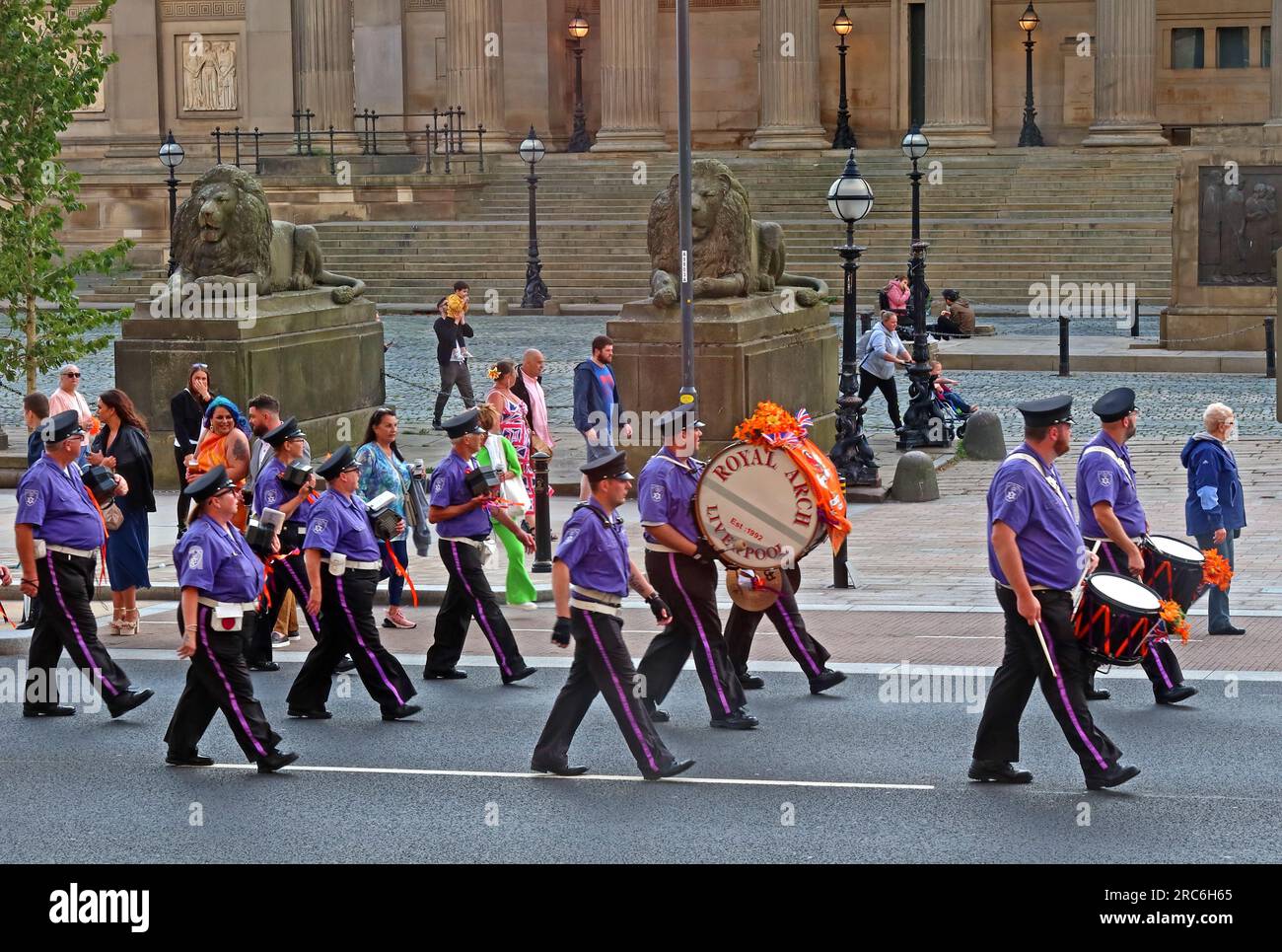 Twelfth of July Battle of The Boyne Orangemen parade, Royalist bands in Lime Street Liverpool, in front of St Georges Hall & cenotaph, Merseyside,  UK Stock Photo