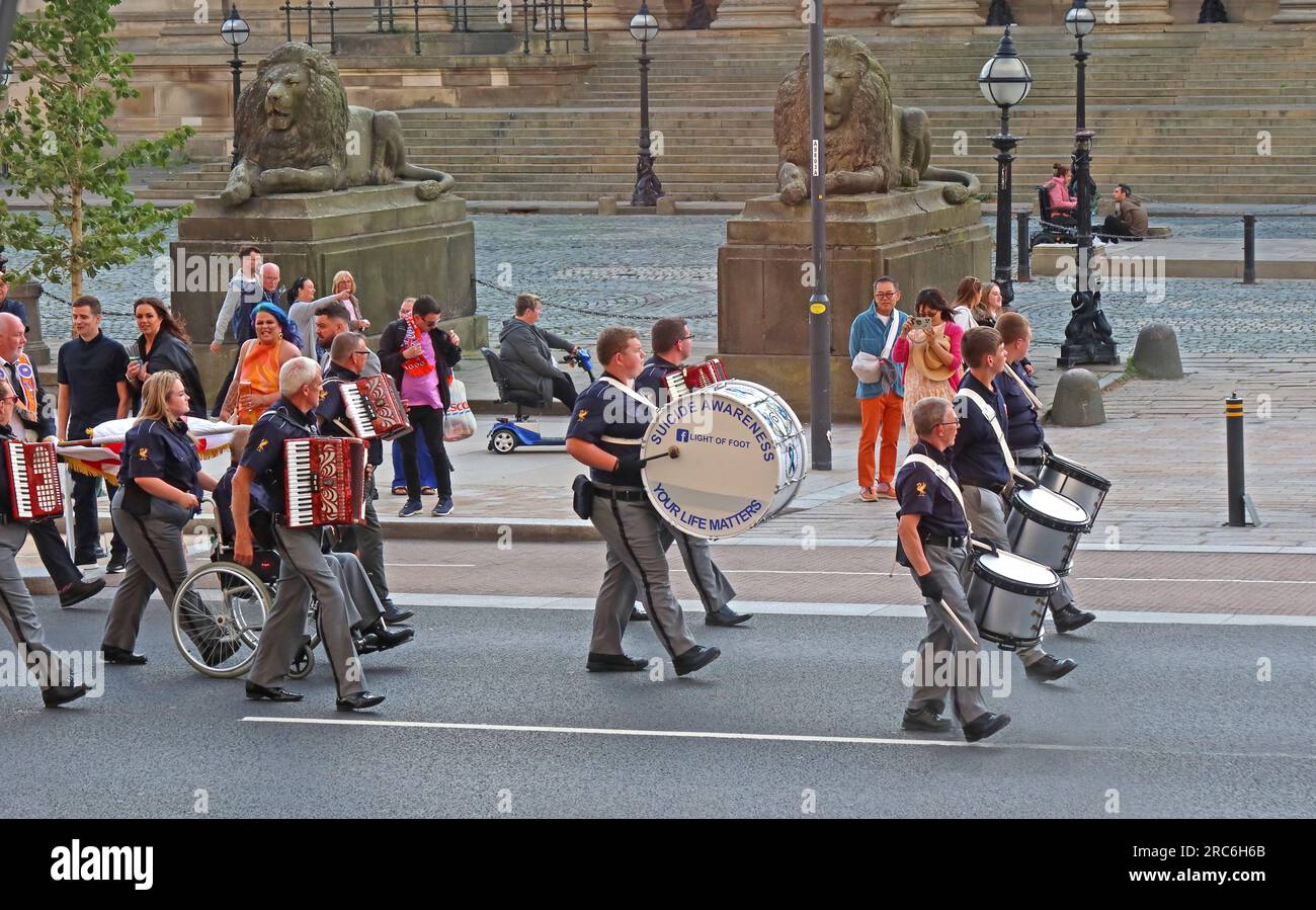 Twelfth of July Battle of The Boyne Orangemen parade, Royalist bands in Lime Street Liverpool, in front of St Georges Hall & cenotaph, Merseyside,  UK Stock Photo