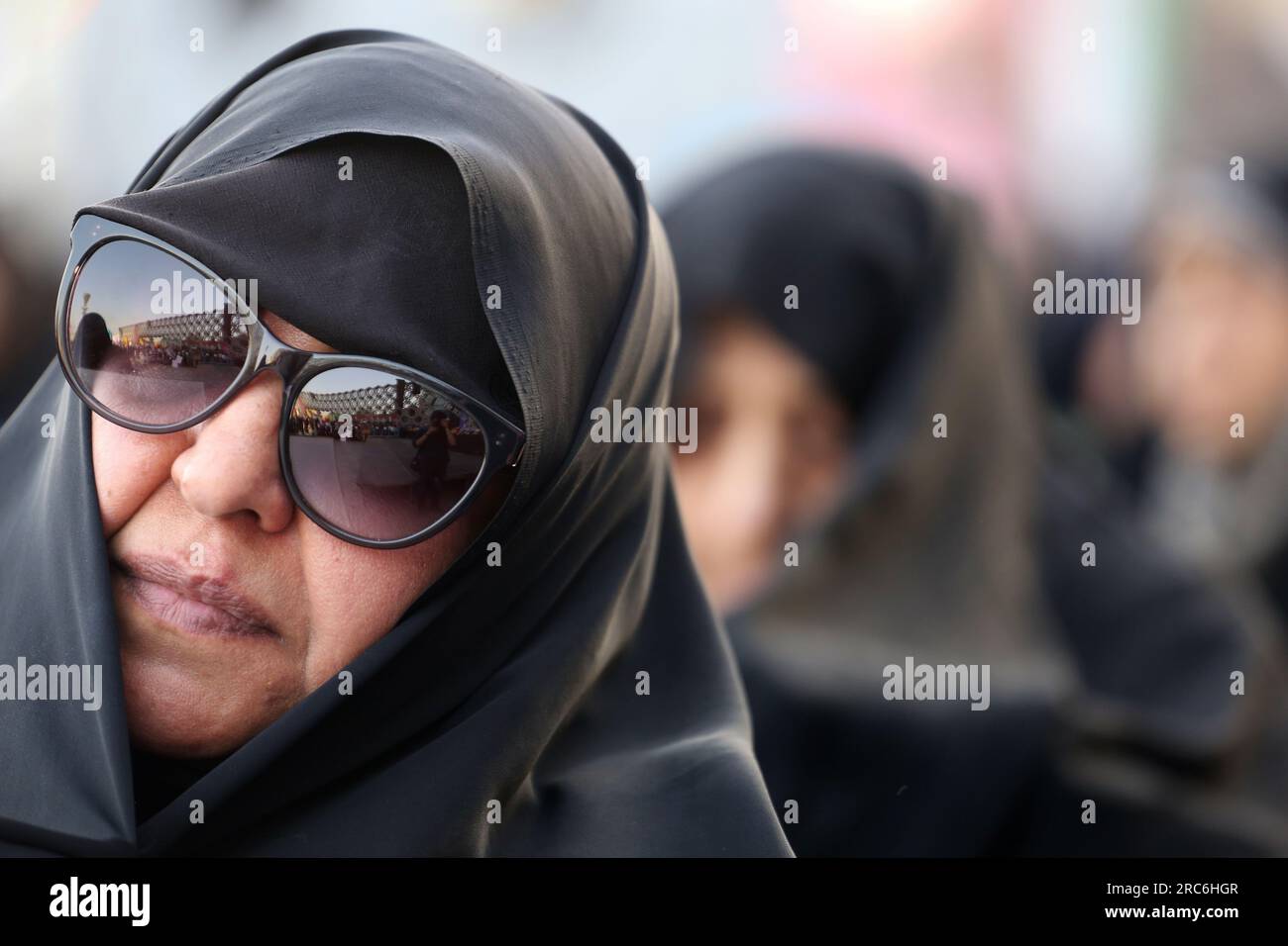 Tehran, Iran. 12th July, 2023. An Iranian veiled woman in a black chador looks on during a pro-hijab rally to mark Hijab and Chastity Day at Imam Hossein Square in downtown Tehran. Many Muslim women around the world choose to cover their hair for religious or traditional reasons, including in Iran. But in Iran, the hijab has also been a contentious political issue for nearly a century. (Credit Image: © Rouzbeh Fouladi/ZUMA Press Wire) EDITORIAL USAGE ONLY! Not for Commercial USAGE! Stock Photo